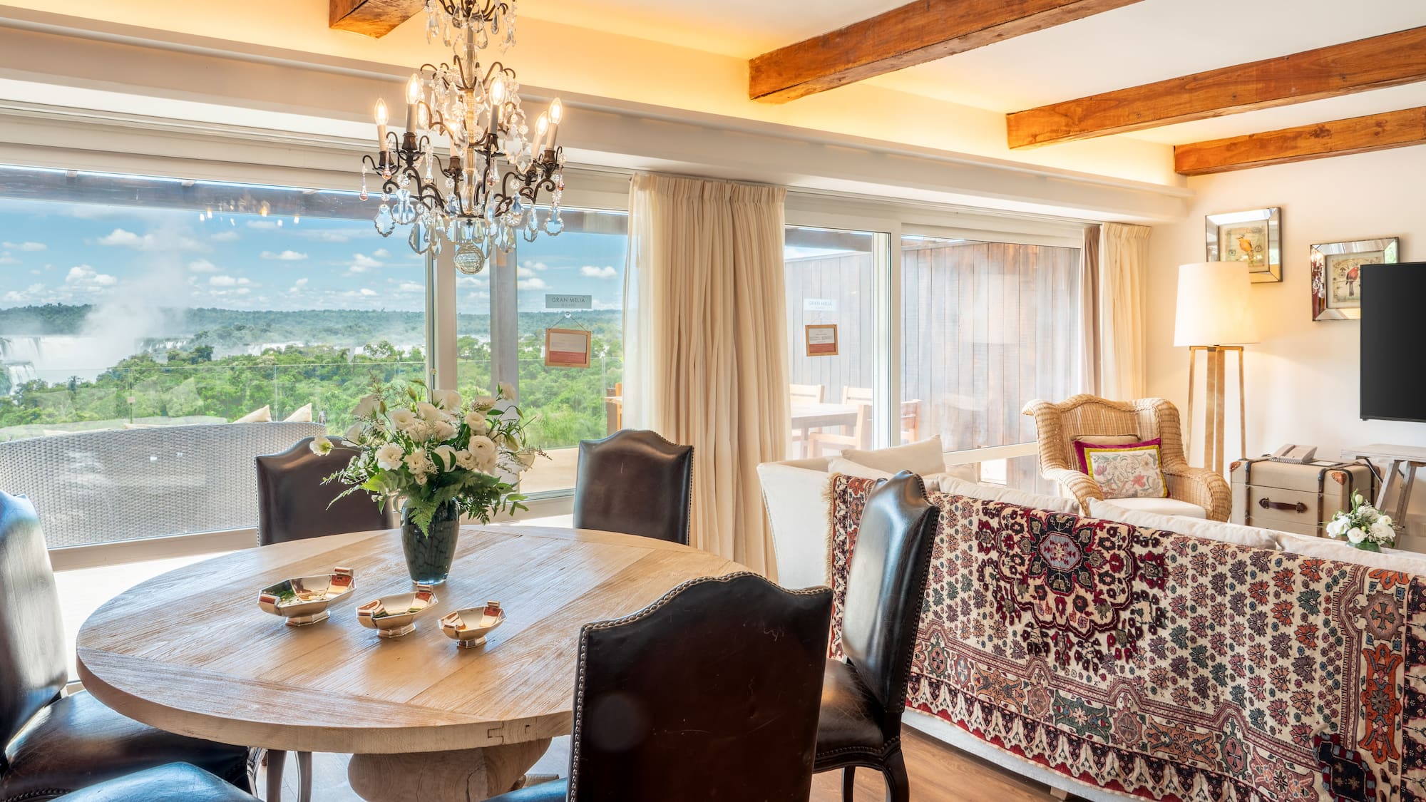 a room with a table and chairs