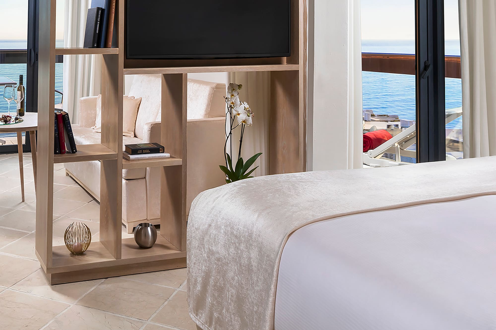 a room with a television and a bed