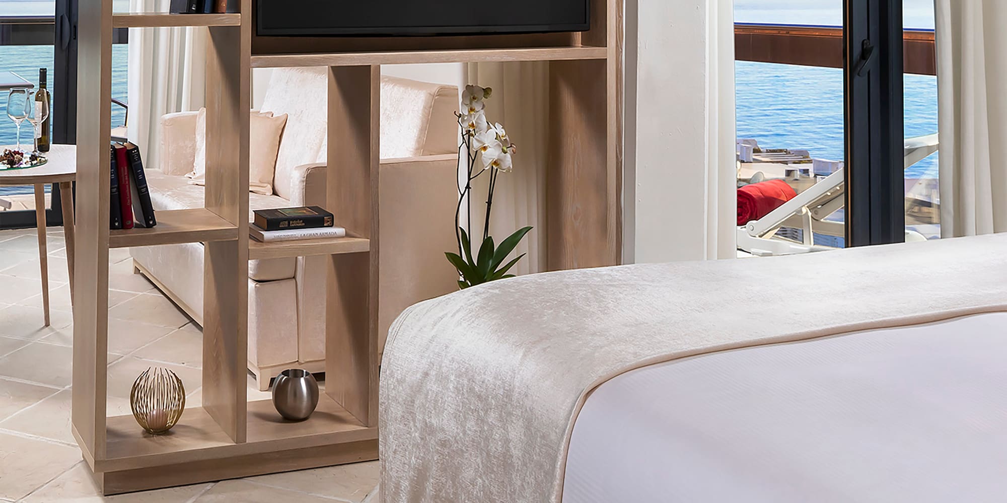 a room with a television and a bed