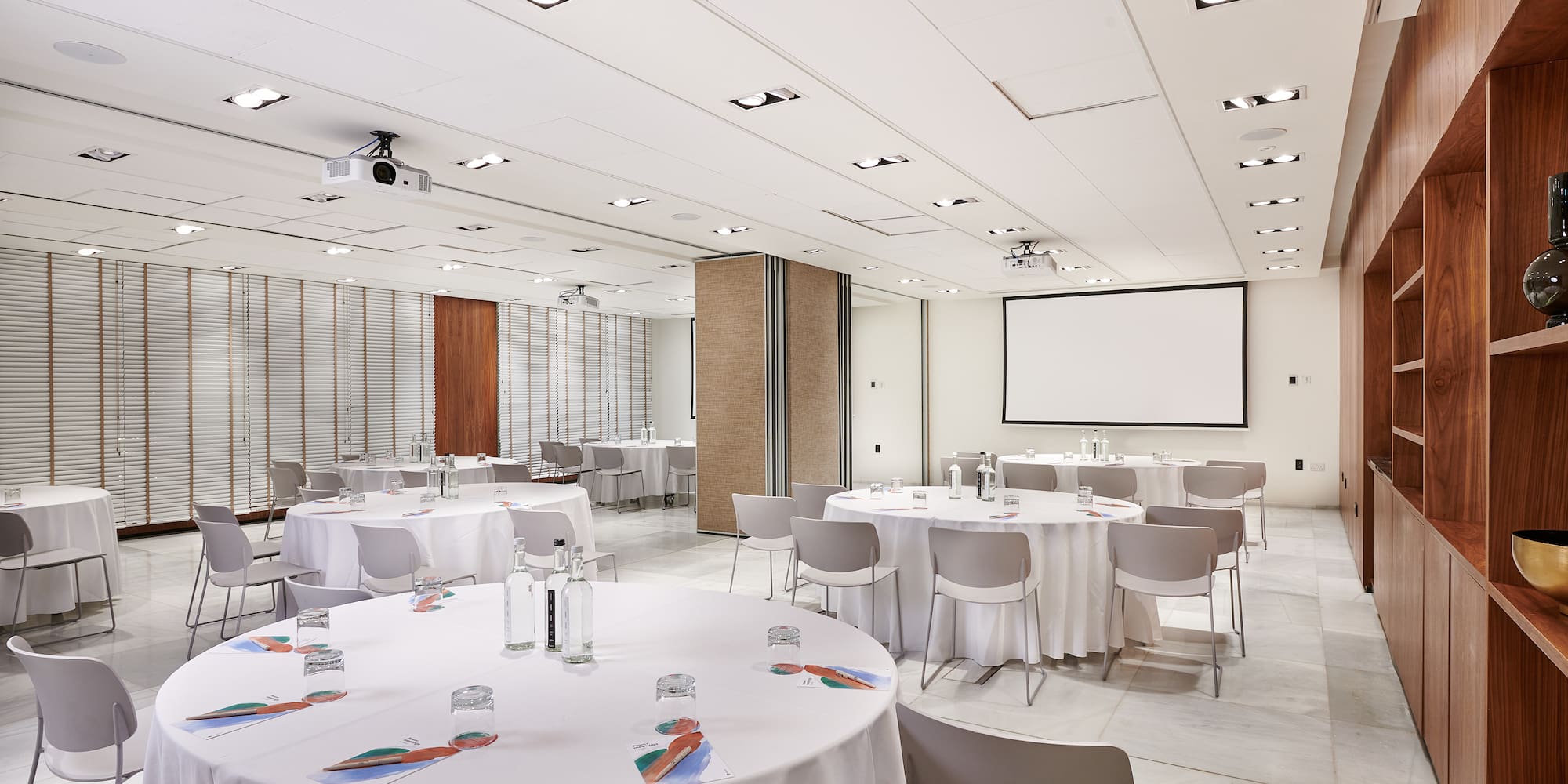 a room with tables and chairs