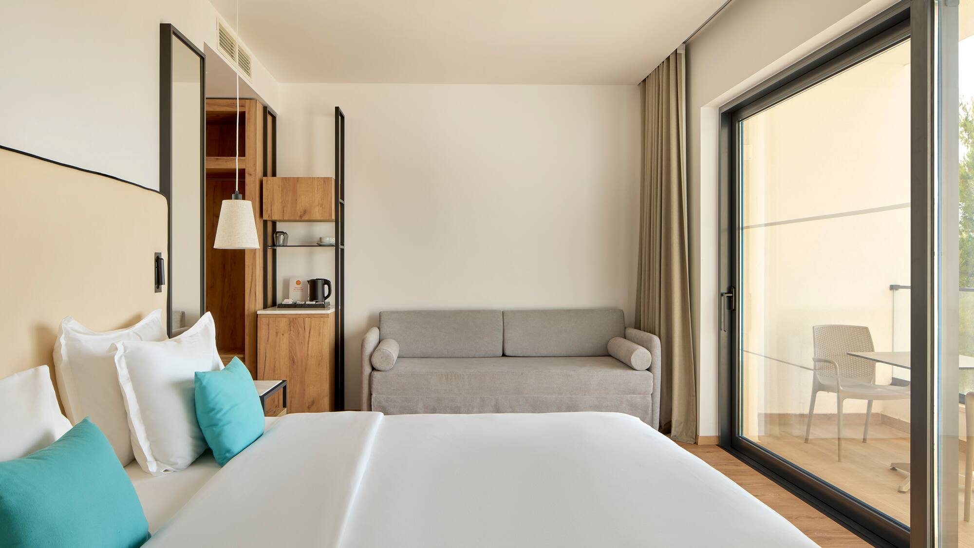 a bedroom with a bed and a couch