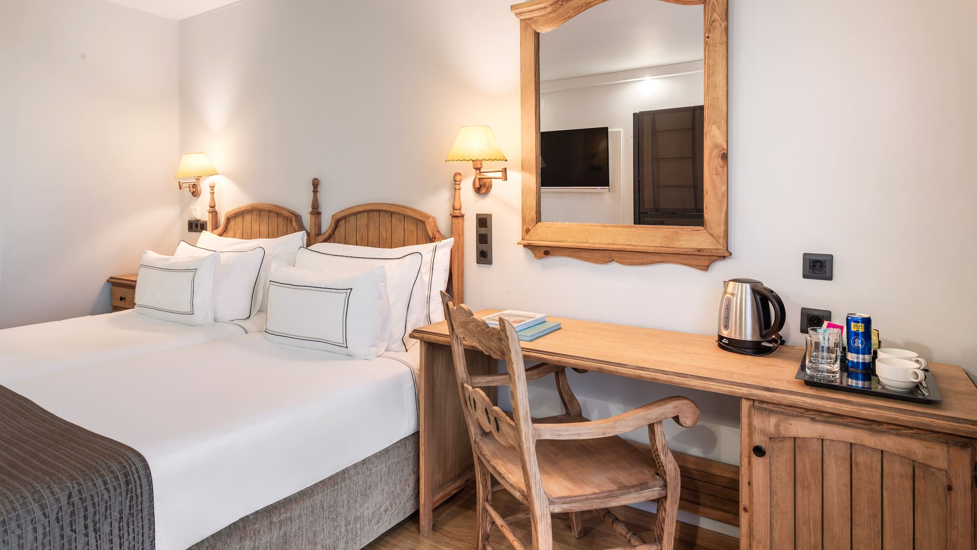 a room with a bed and a desk