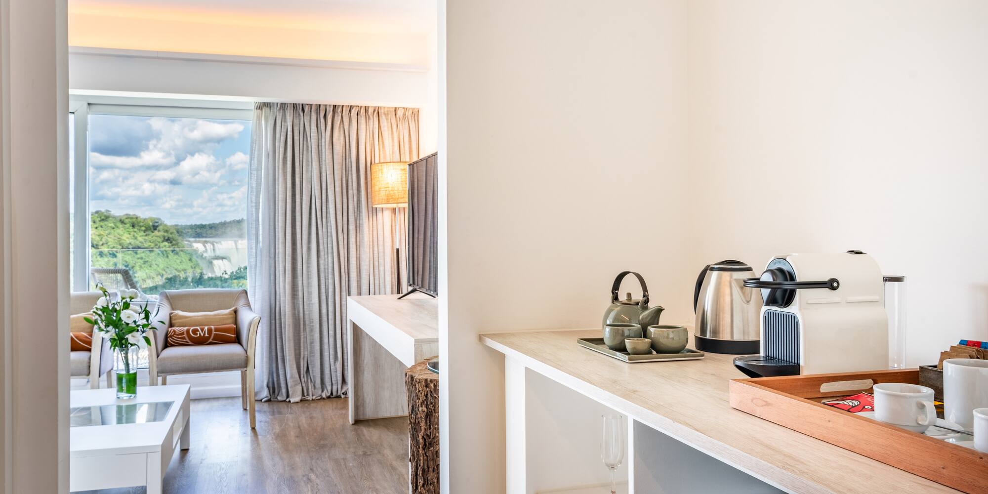 a room with a kitchen and a couch