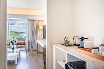 a room with a kitchen and a couch