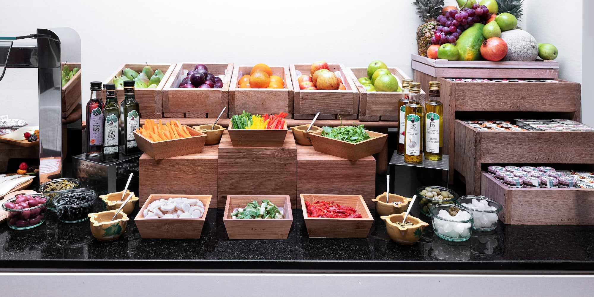 a counter with different fruits and vegetables
