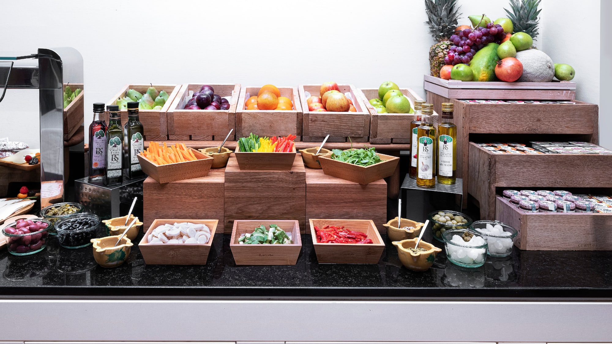 a counter with different fruits and vegetables