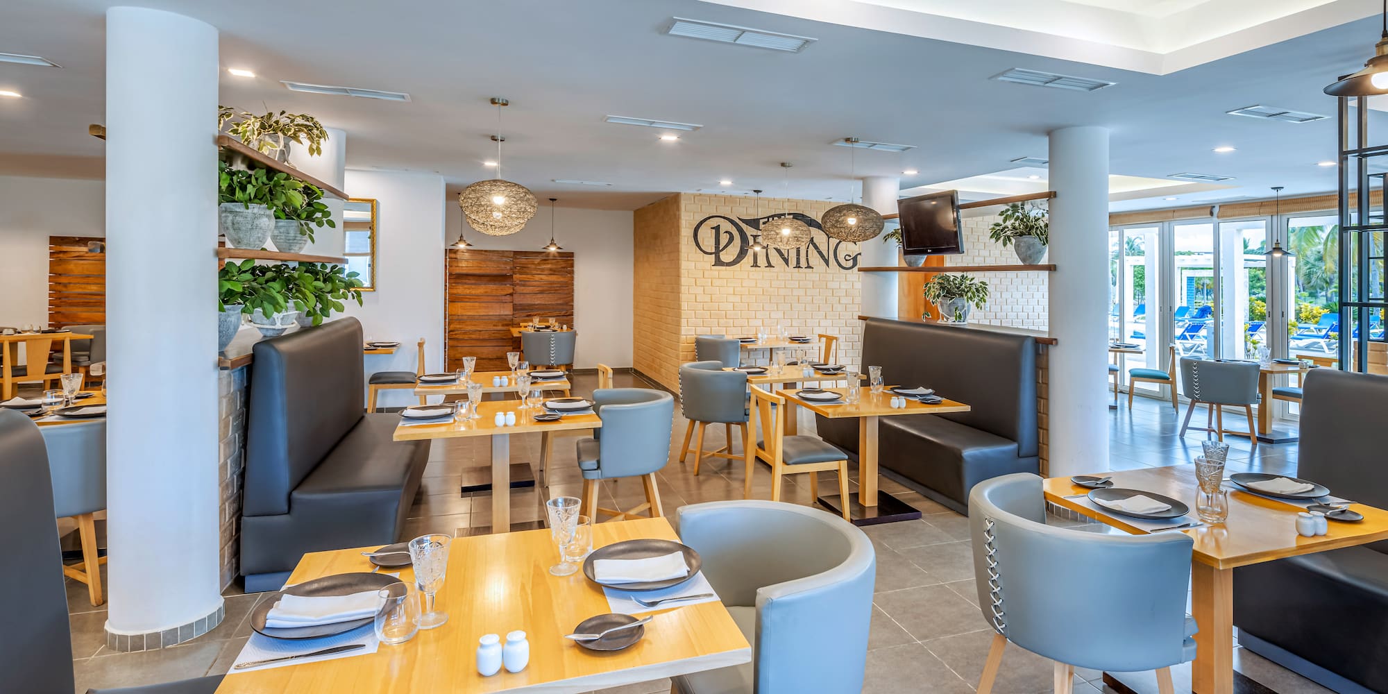 a restaurant with tables and chairs