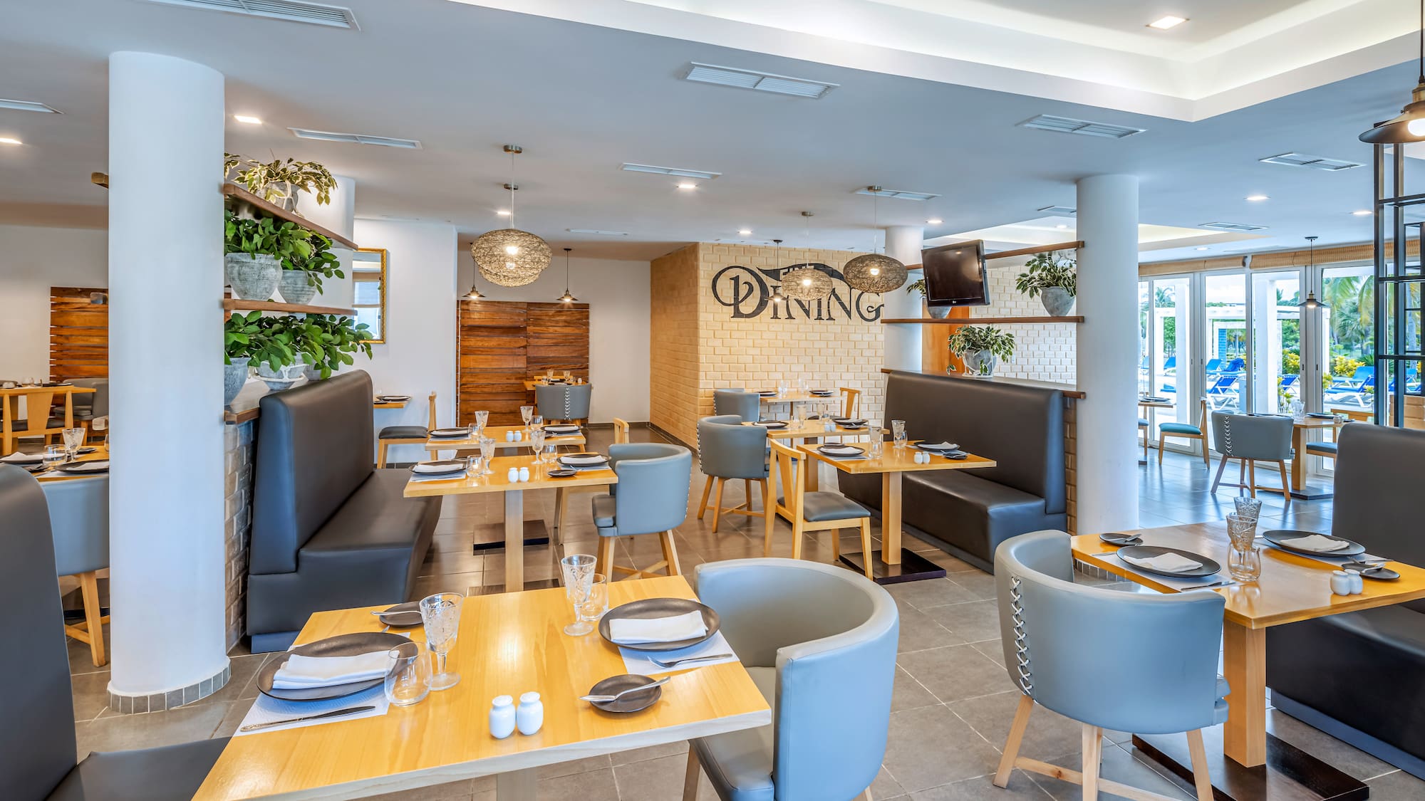 a restaurant with tables and chairs