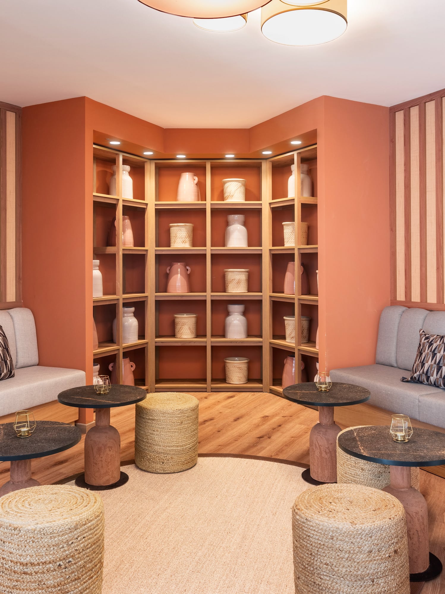 a room with a couch and tables