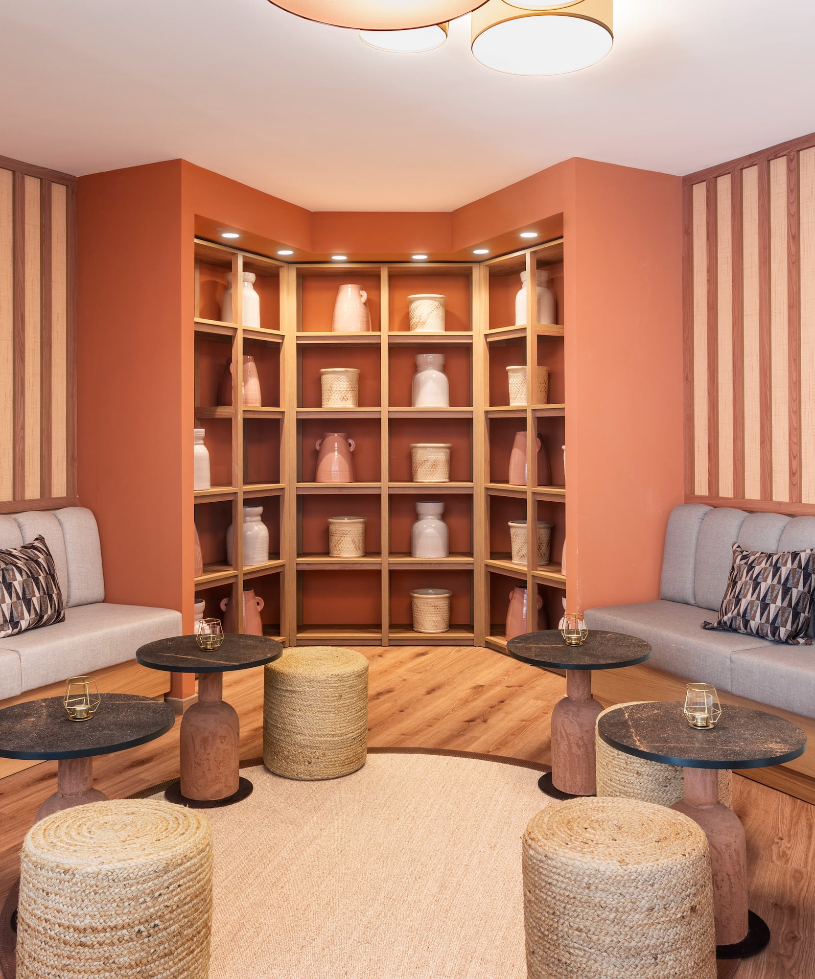 a room with a couch and tables