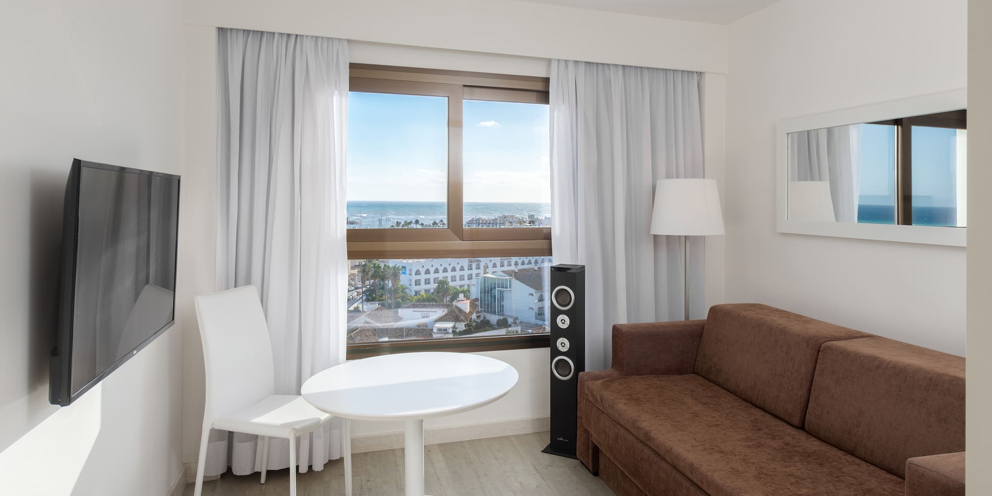 a room with a couch and a table