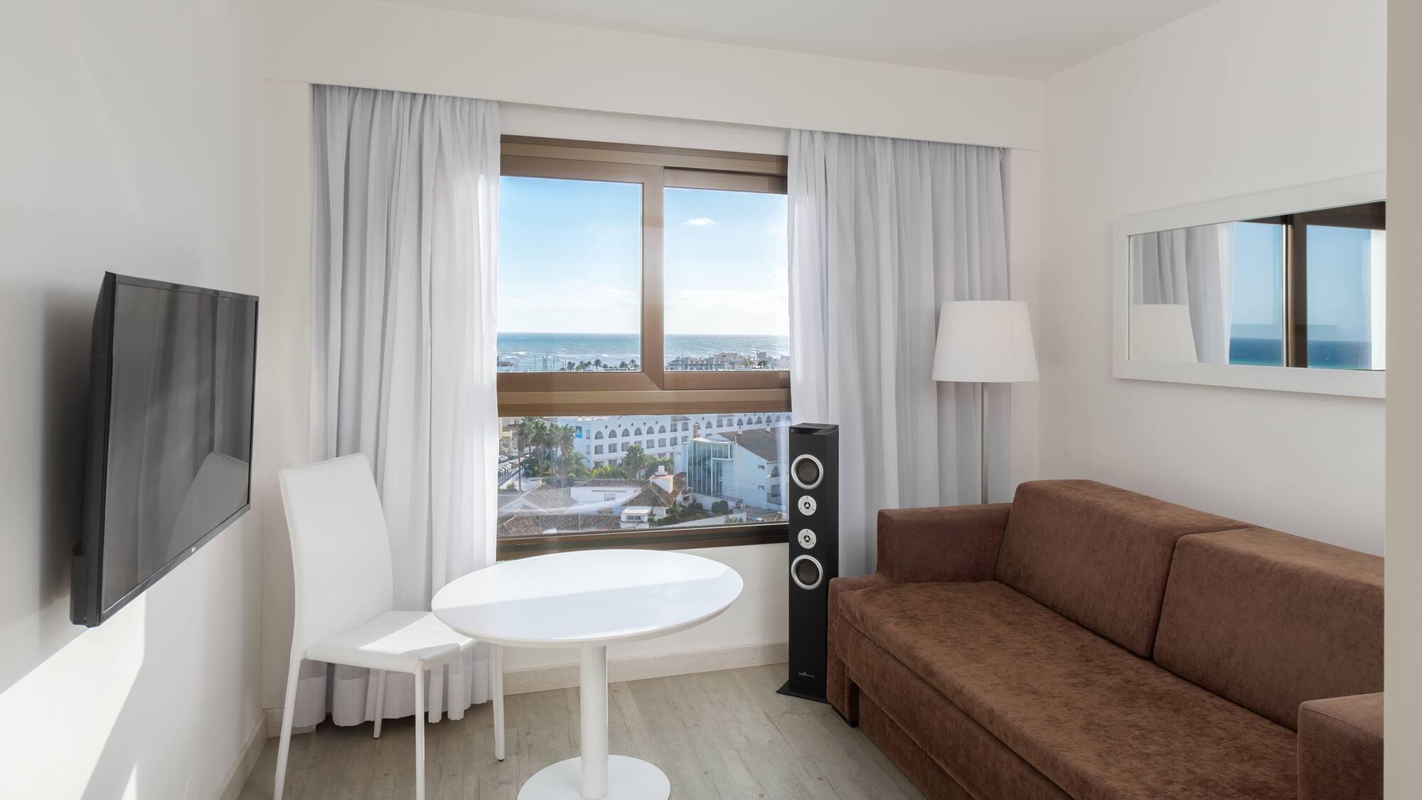 a room with a couch and a table