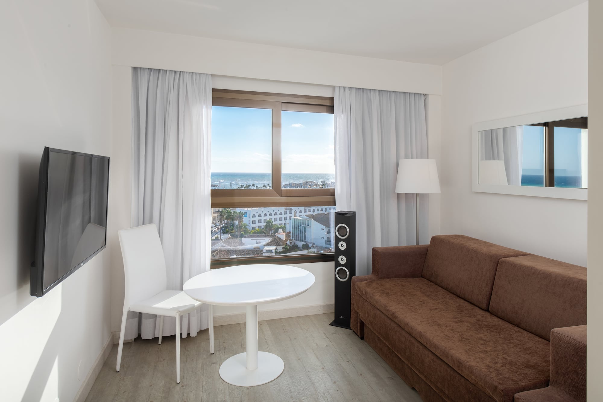 a room with a couch and a table