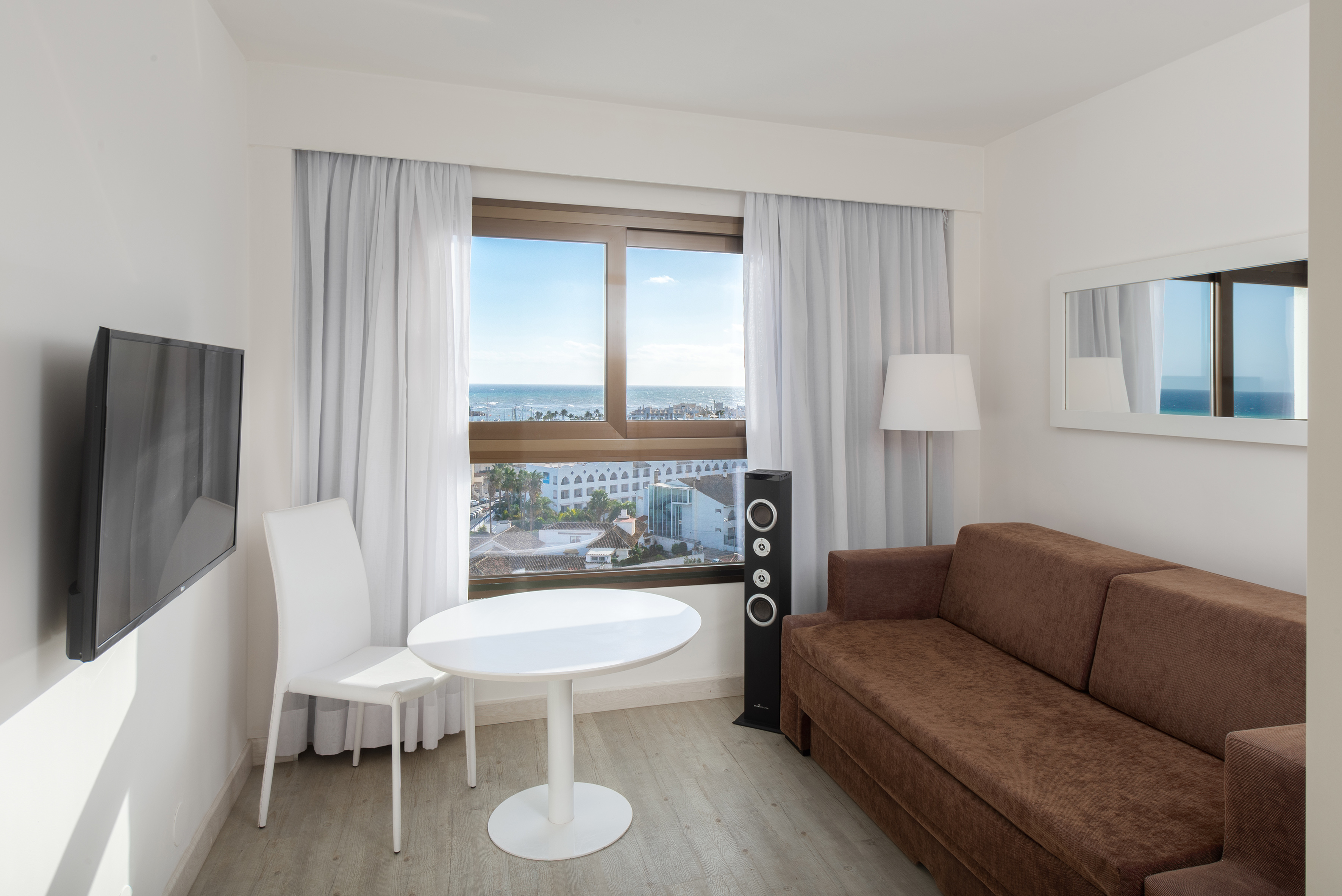 a room with a couch and a table