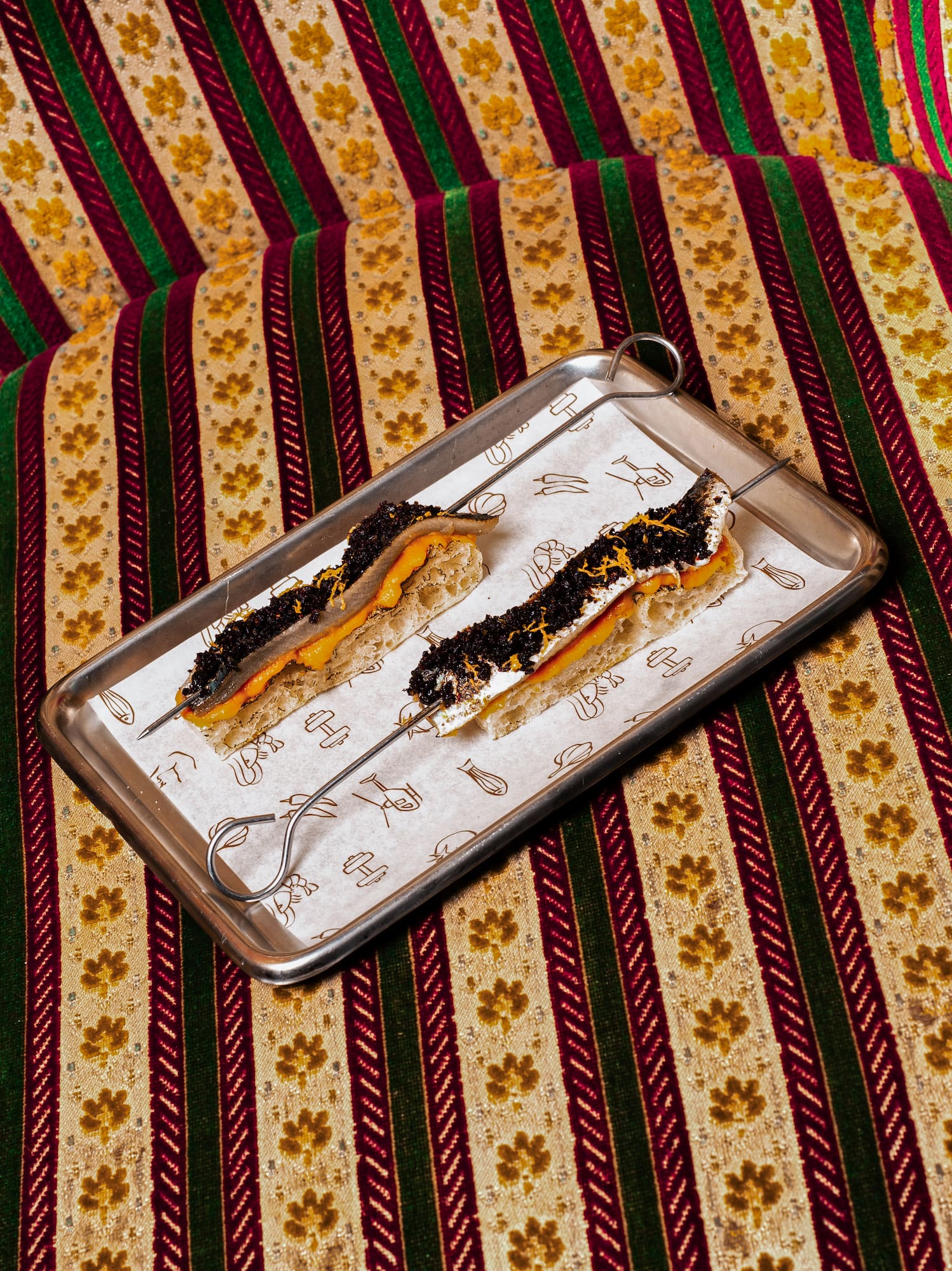 a tray of food on a couch