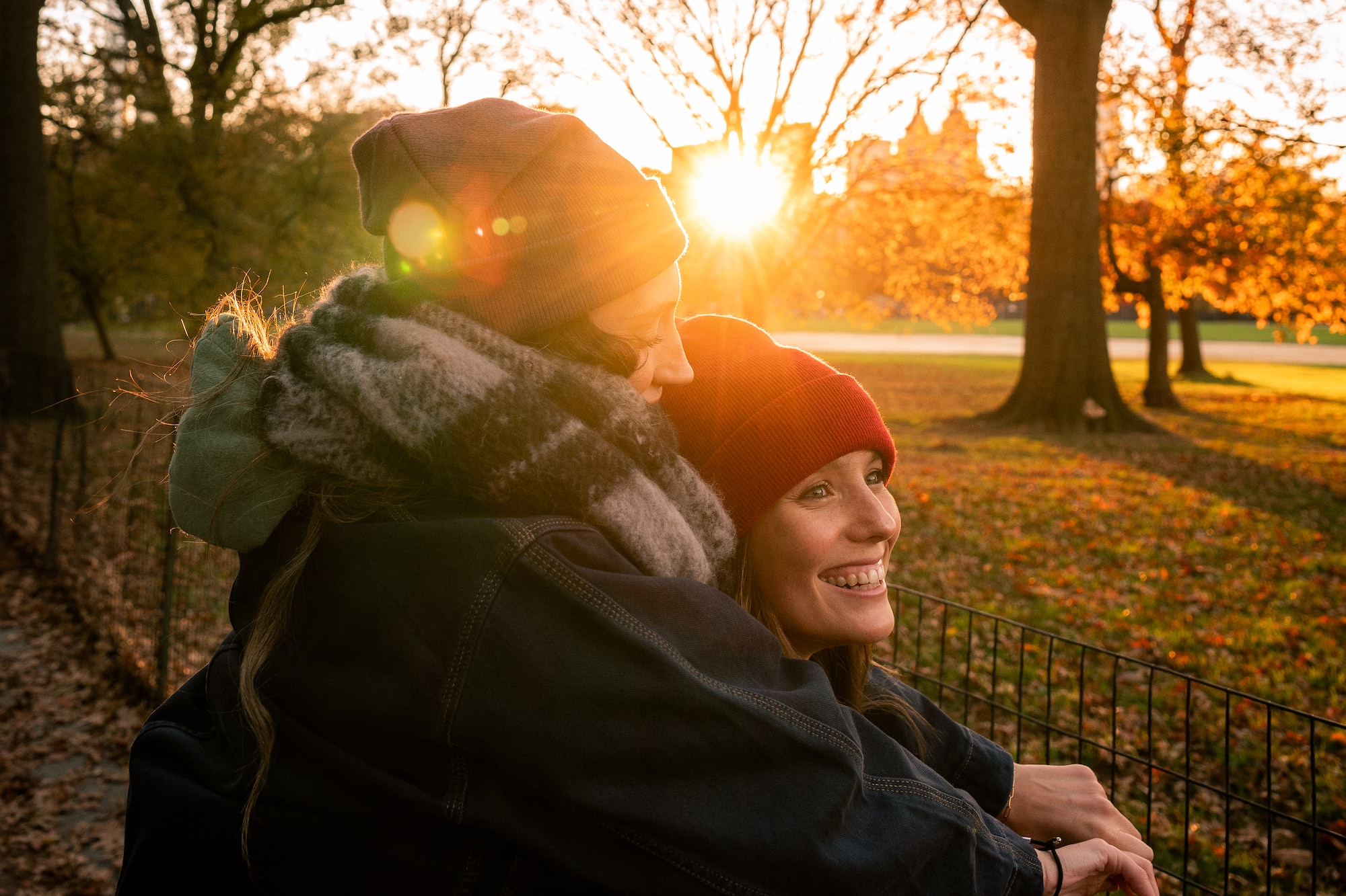 a woman hugging another woman