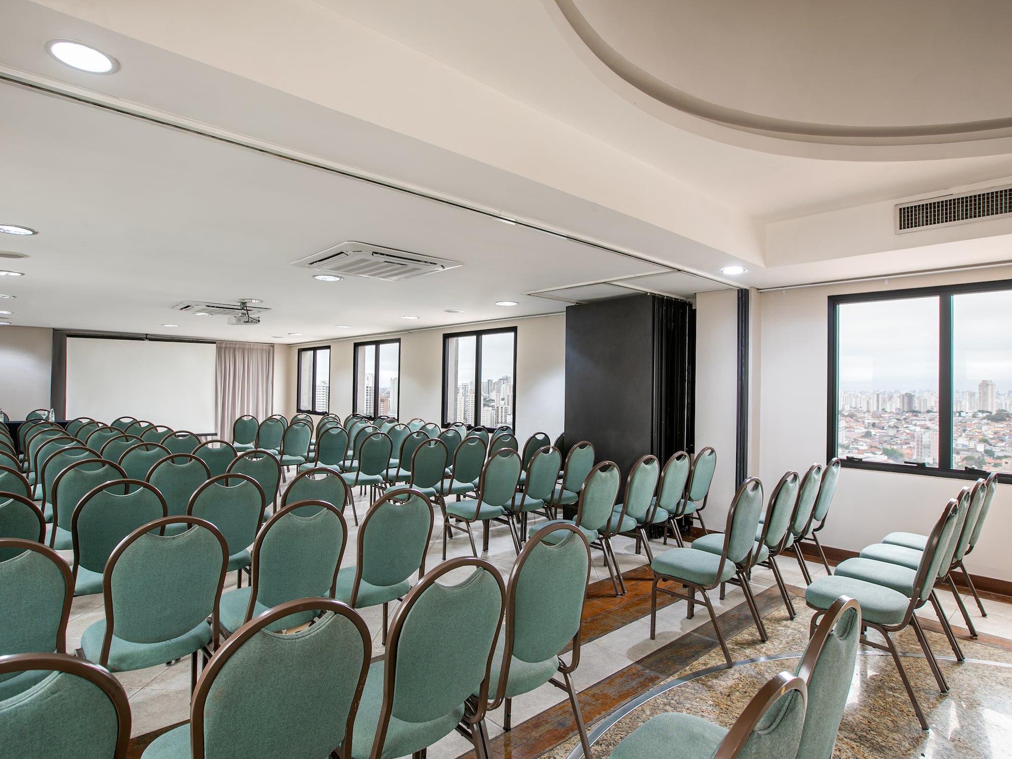a room with rows of chairs