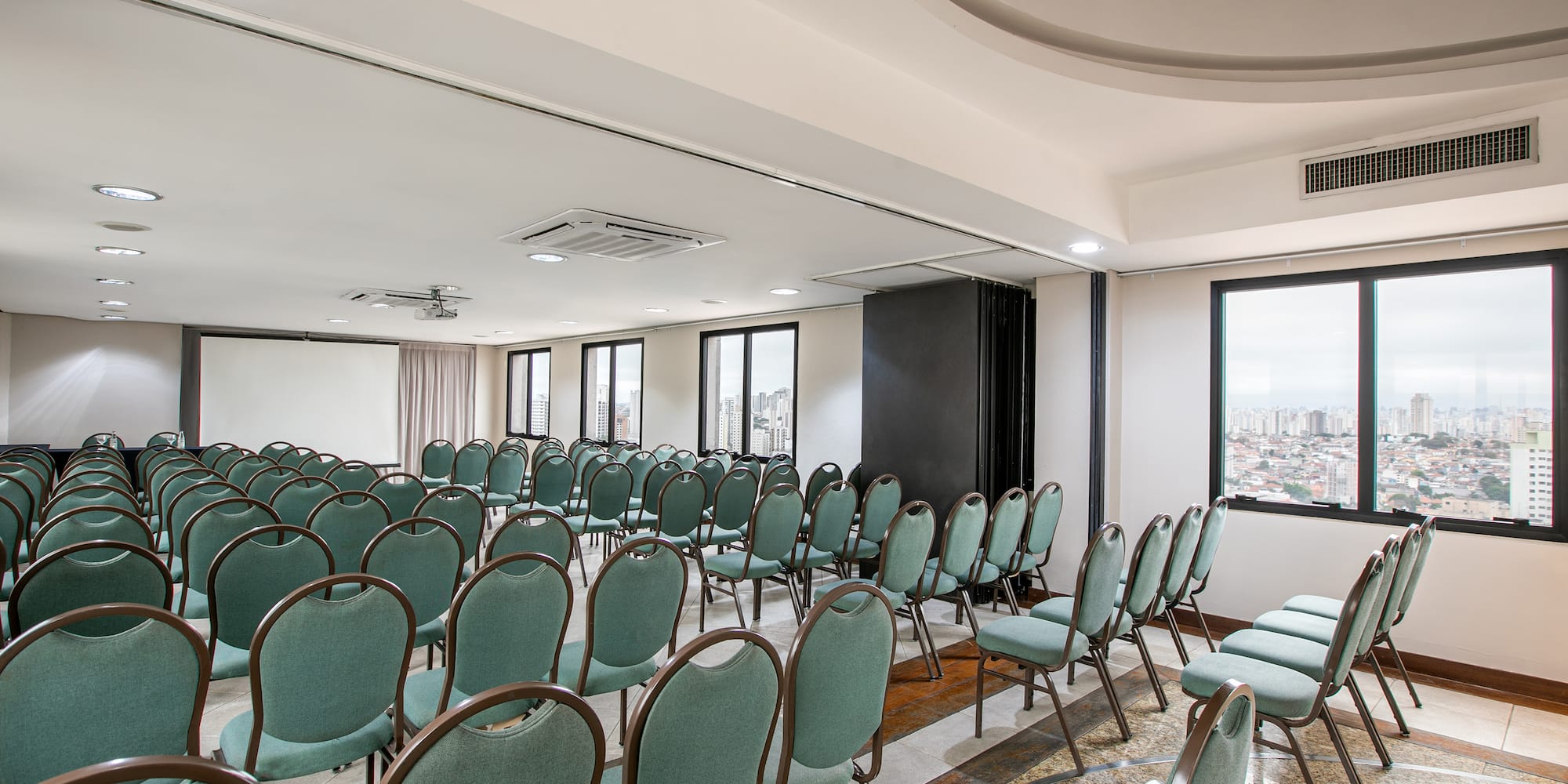 a room with rows of chairs