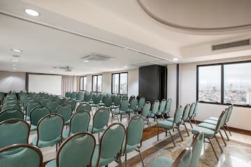 a room with rows of chairs
