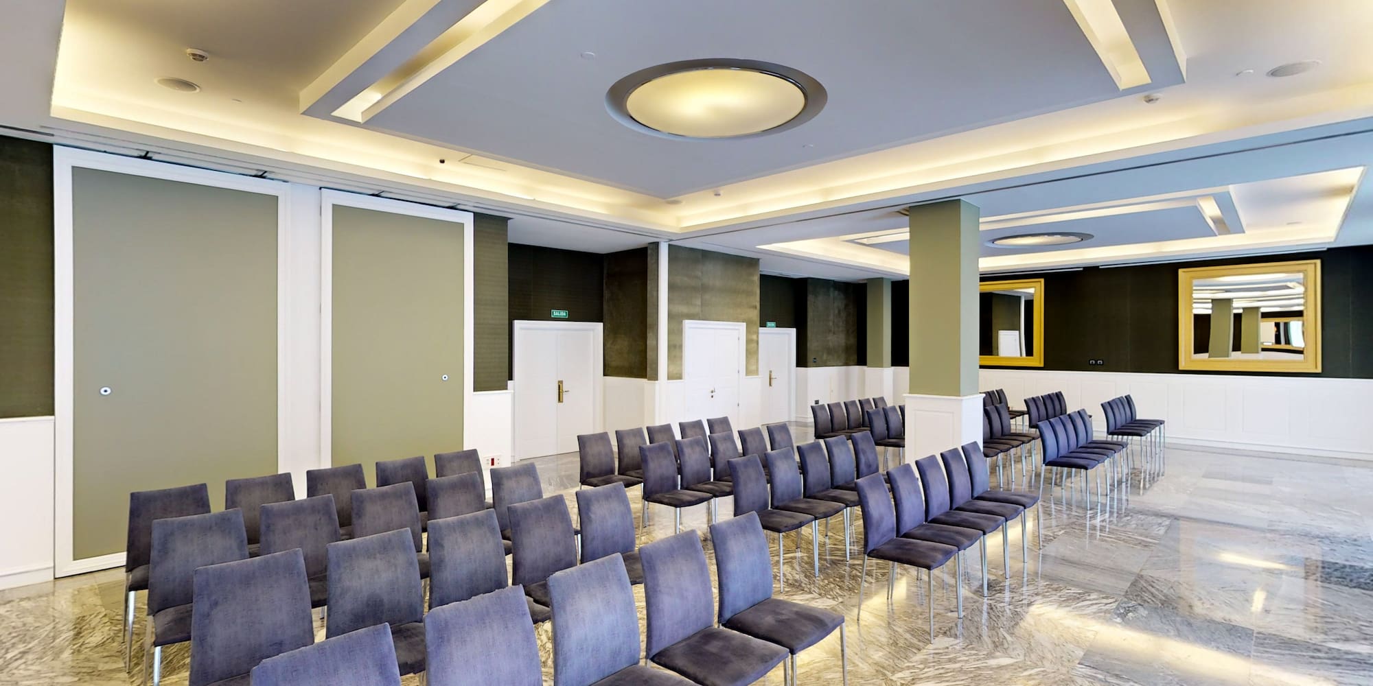 a room with rows of chairs