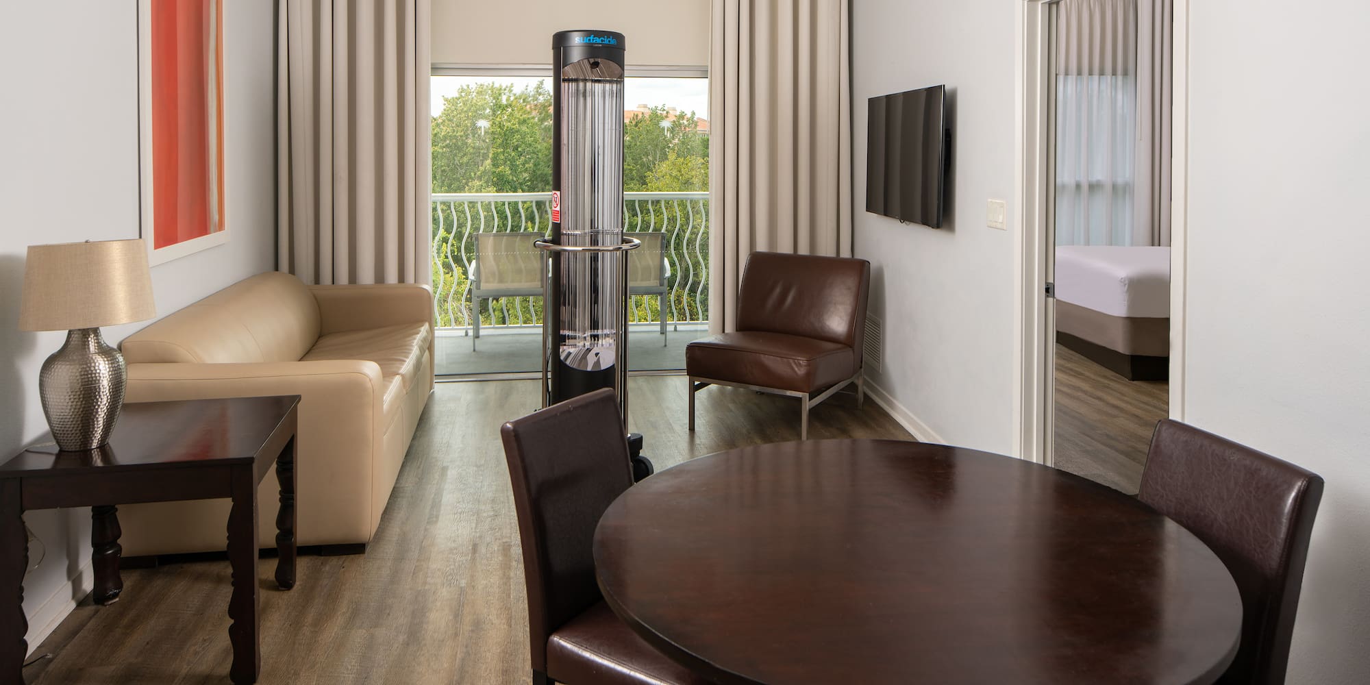 a room with a table and chairs