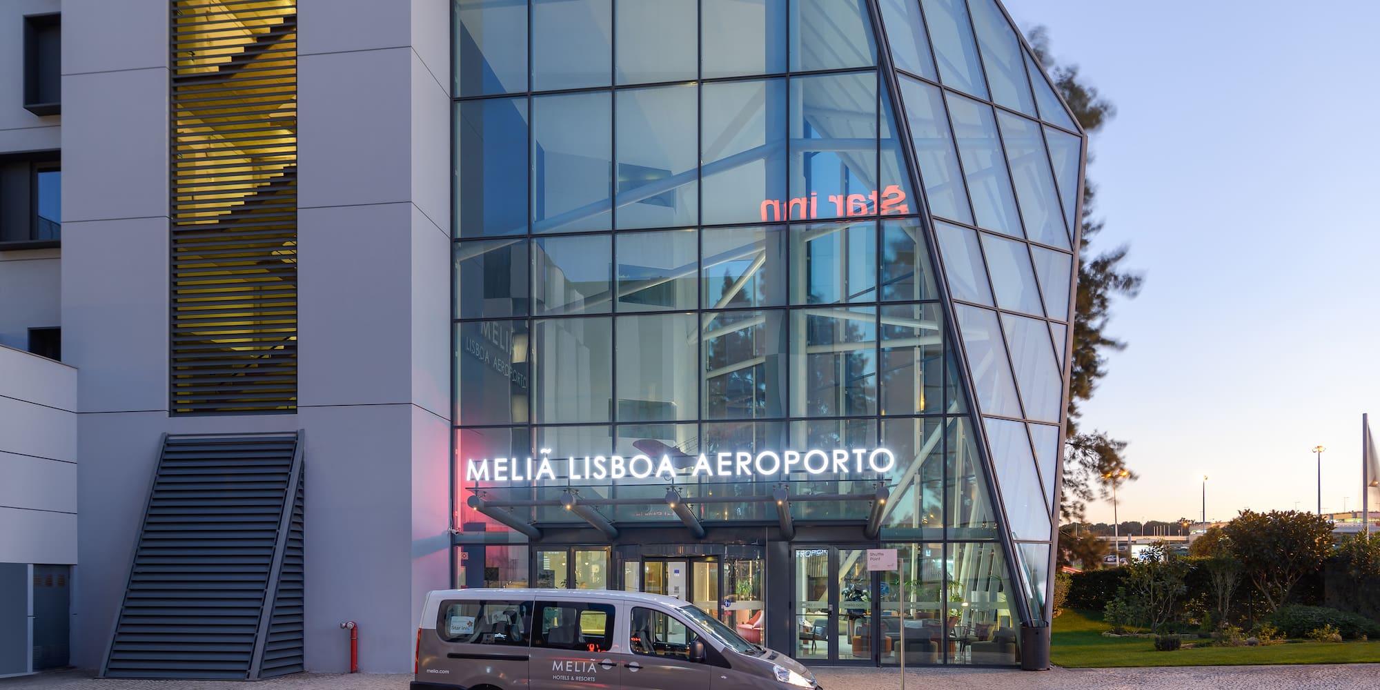 a van parked outside of a building