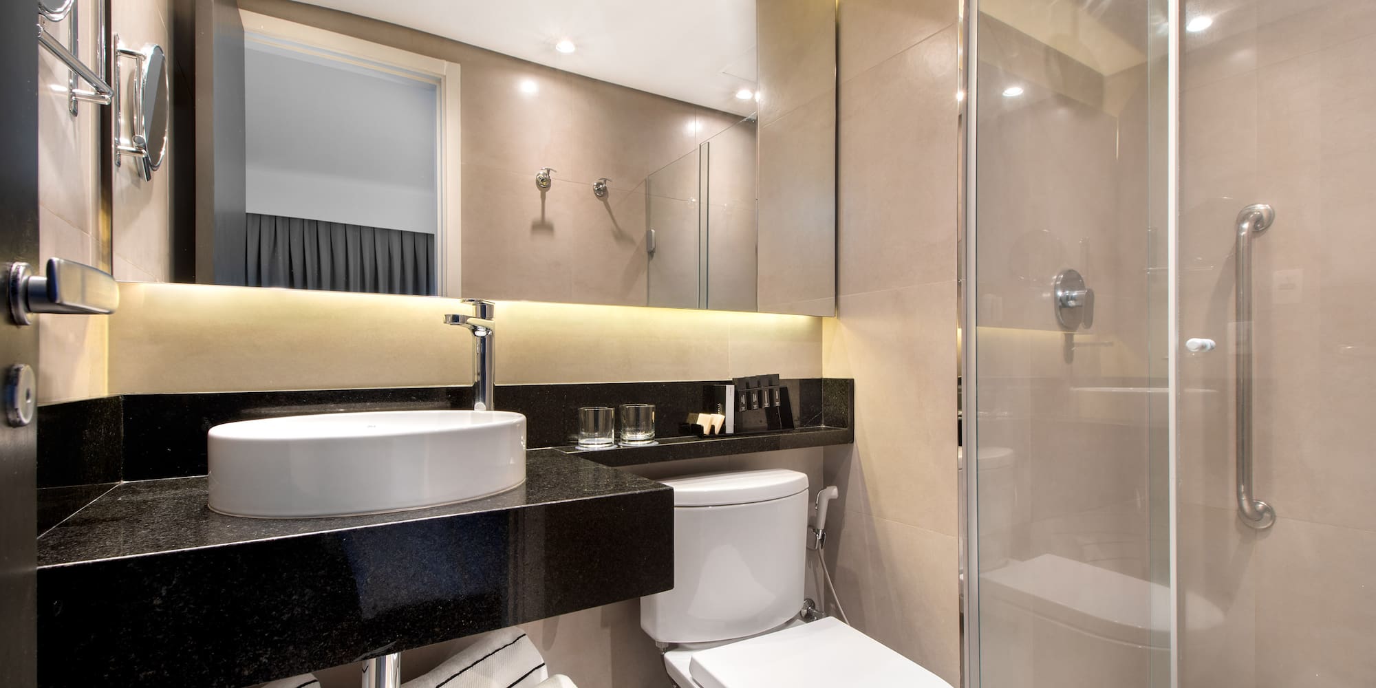 a bathroom with a sink and shower