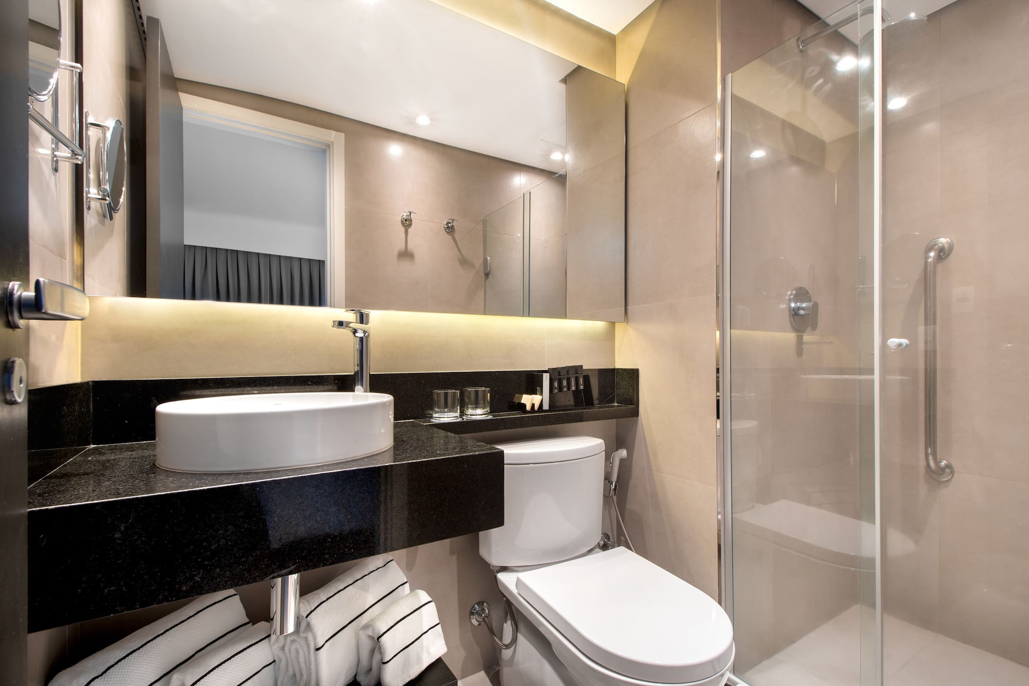 a bathroom with a sink and shower