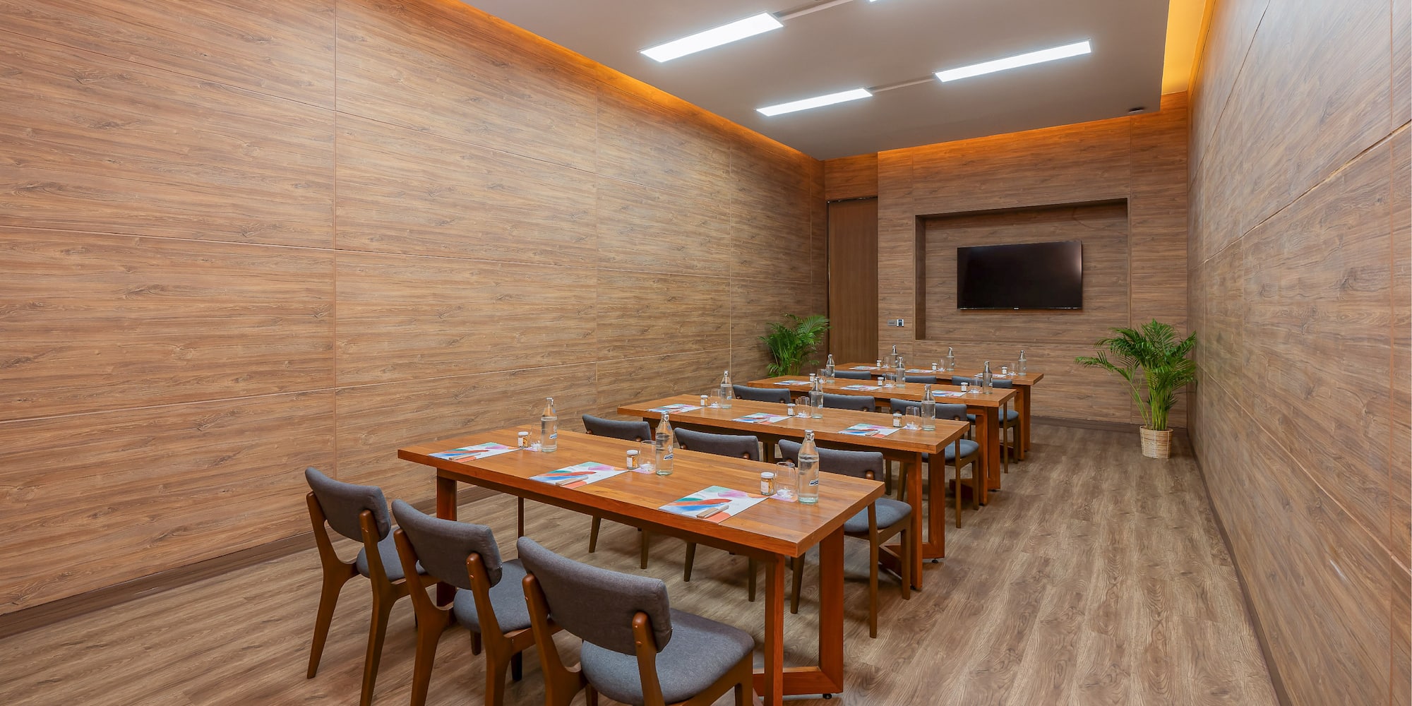 a room with tables and chairs