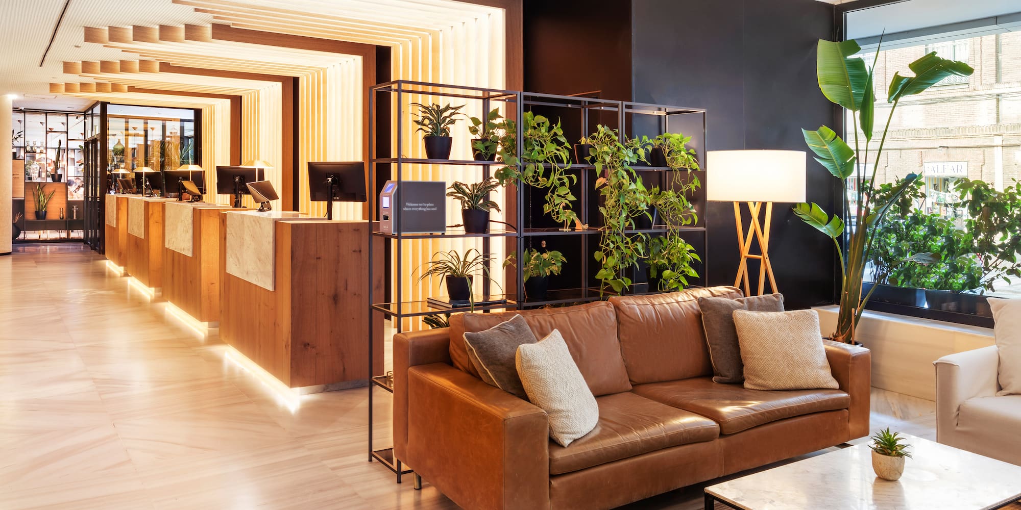 a brown couch in a lobby