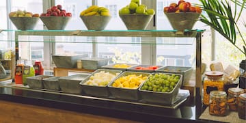 a display of fruit on a shelf