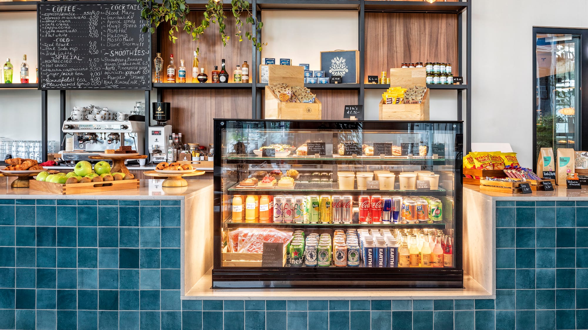a display case with drinks and beverages in it