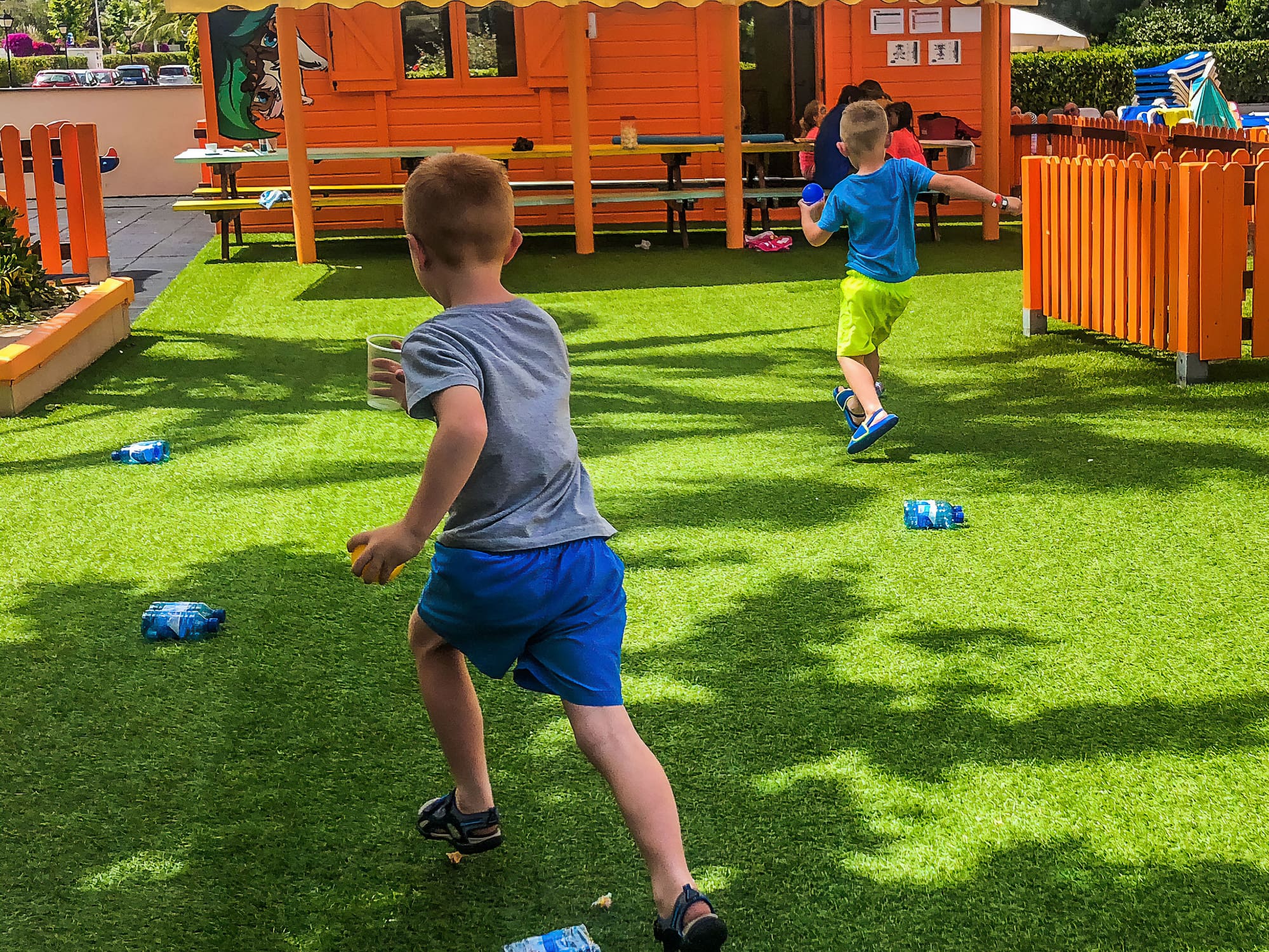 a group of kids playing in a playground