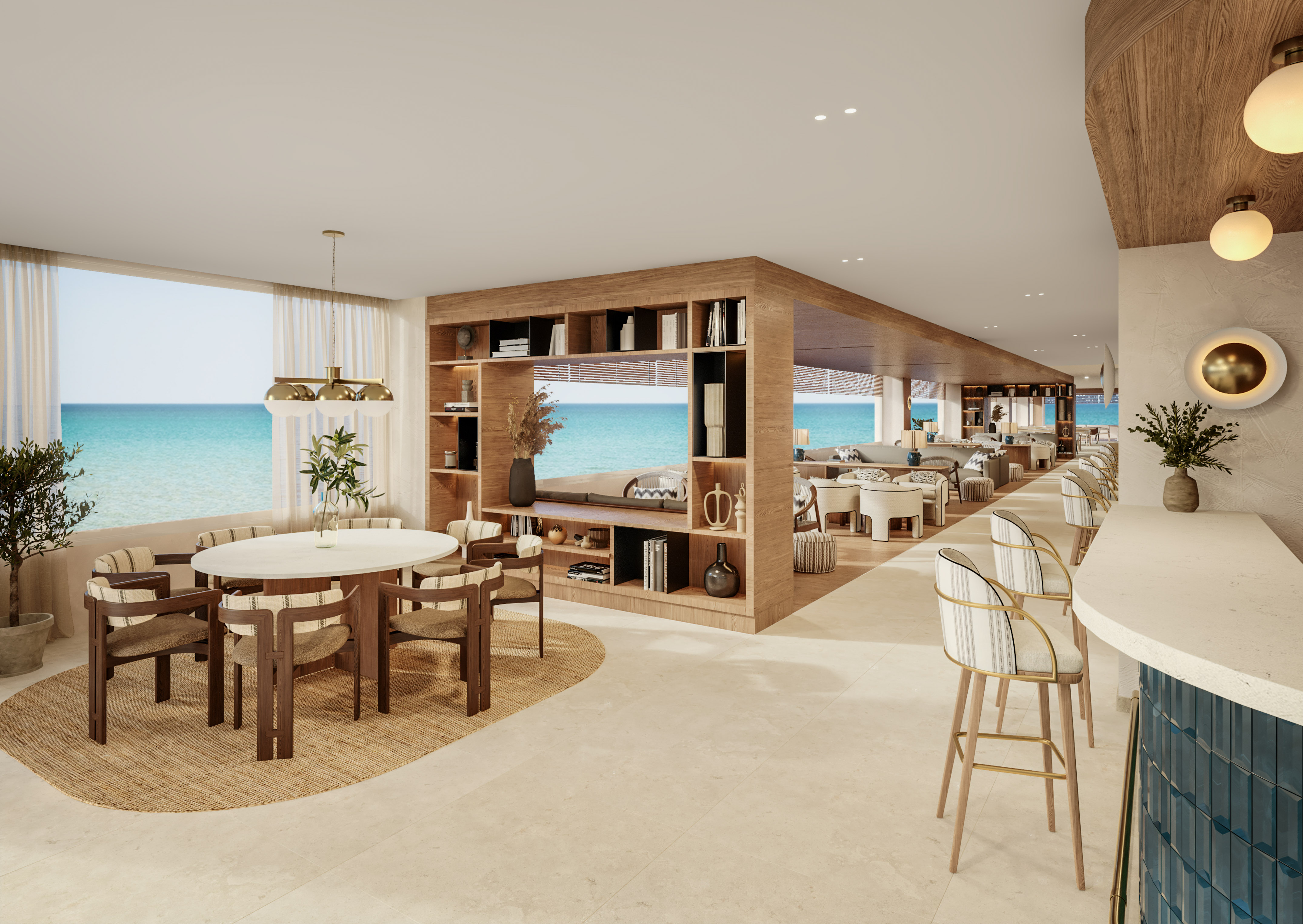 Luxury beachfront lounge with ocean view, dining tables, and modern bar.