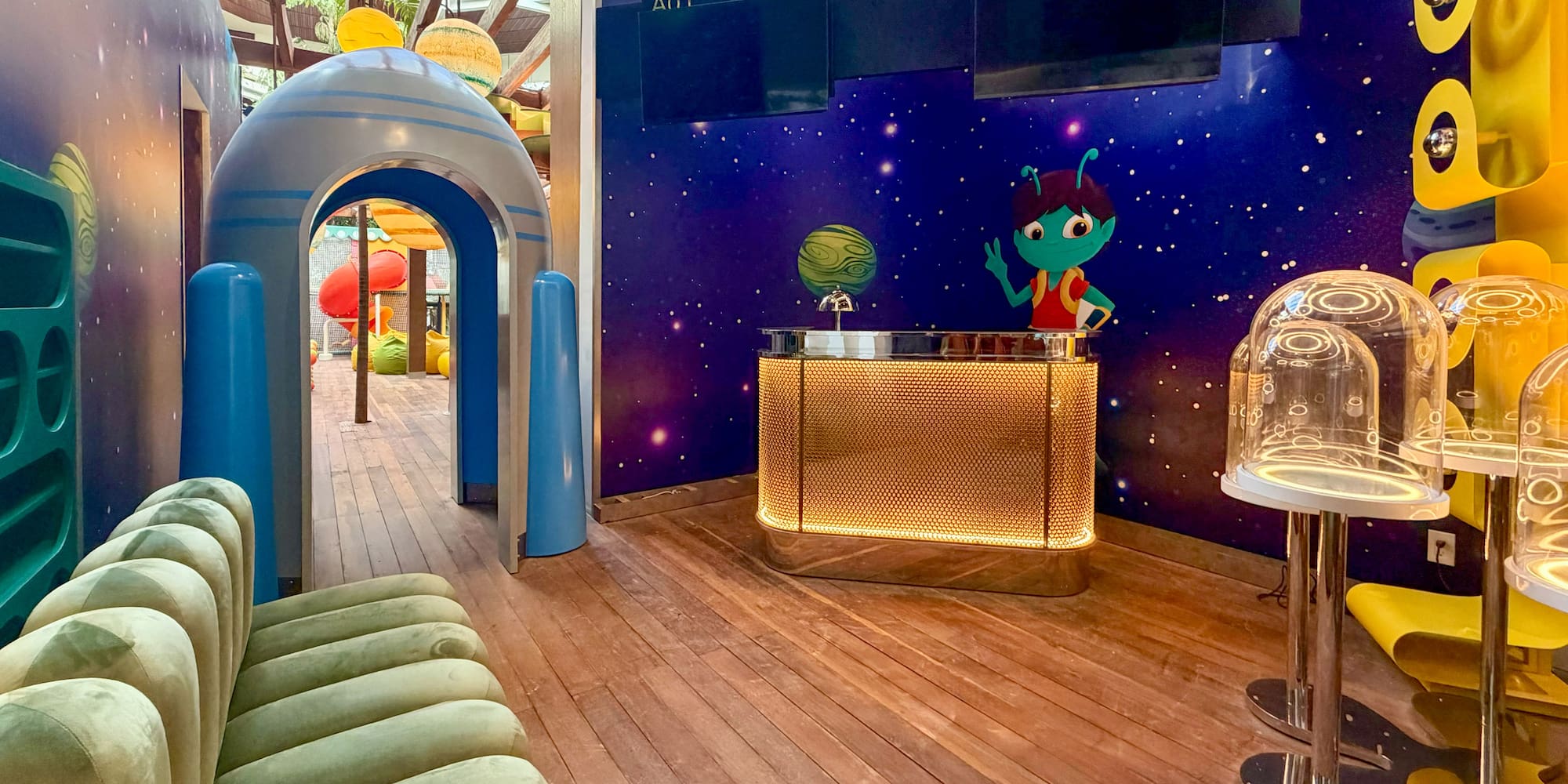 a room with wooden columns and toys