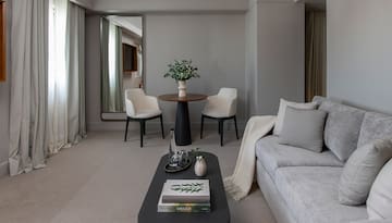 a living room with a couch and a table