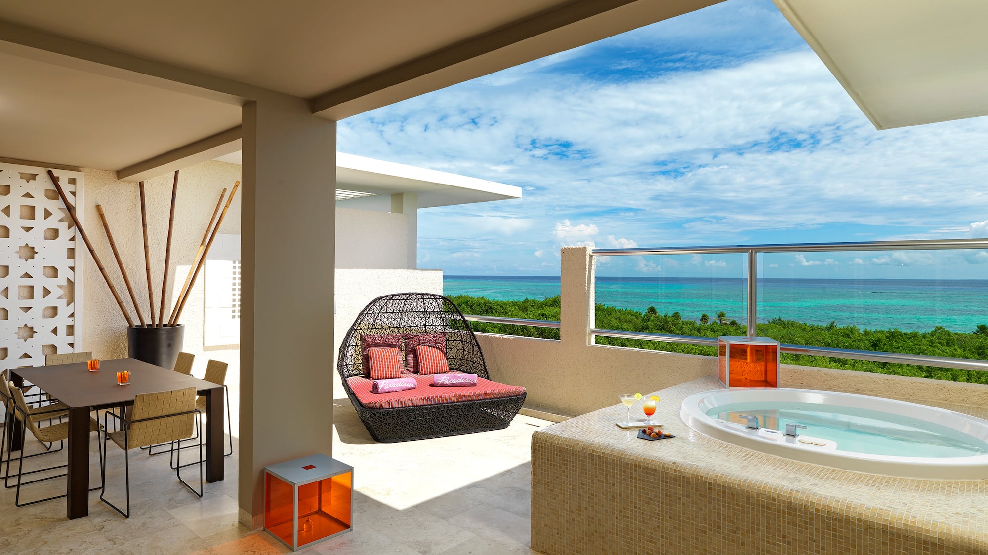 a hot tub with a view of the ocean