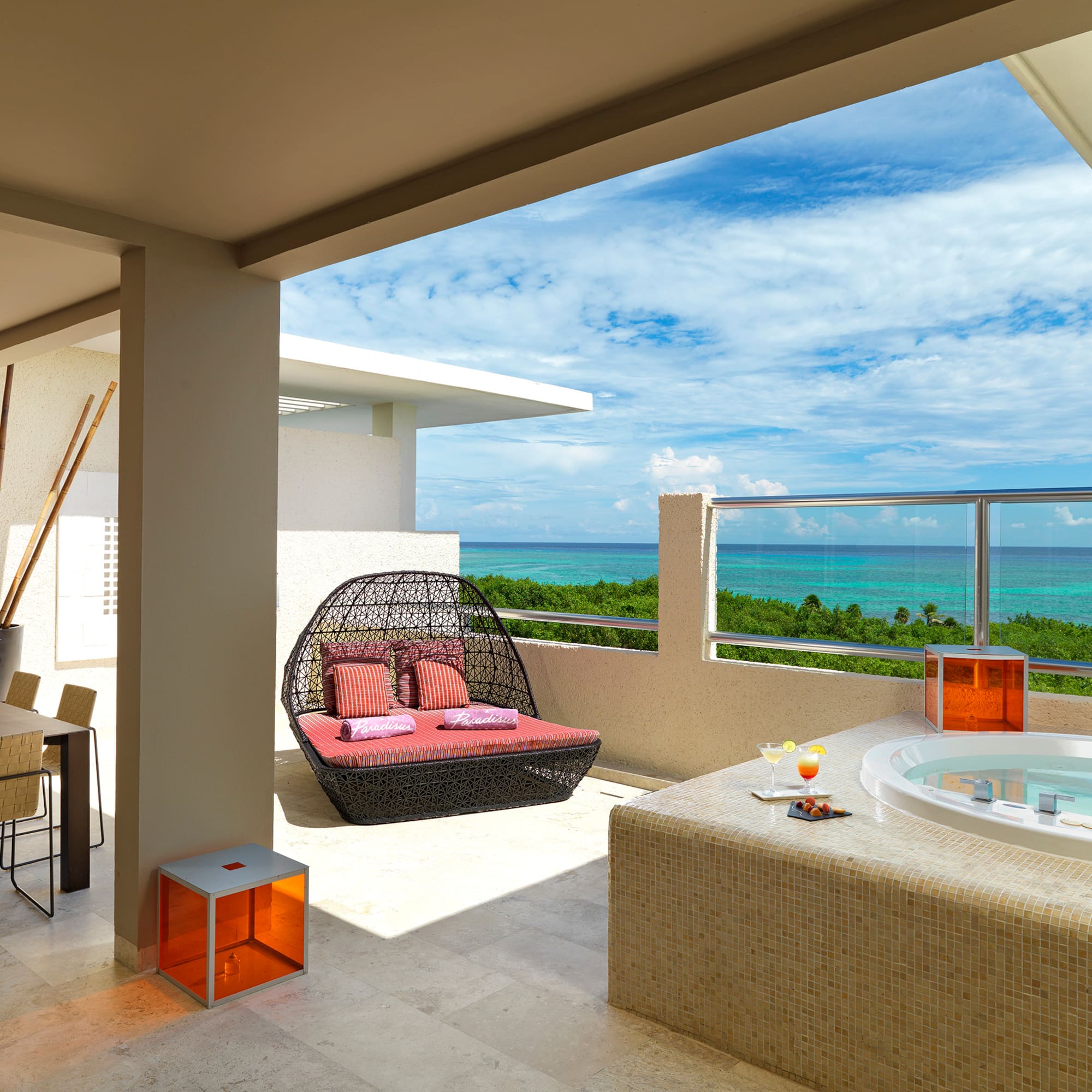 a hot tub with a view of the ocean