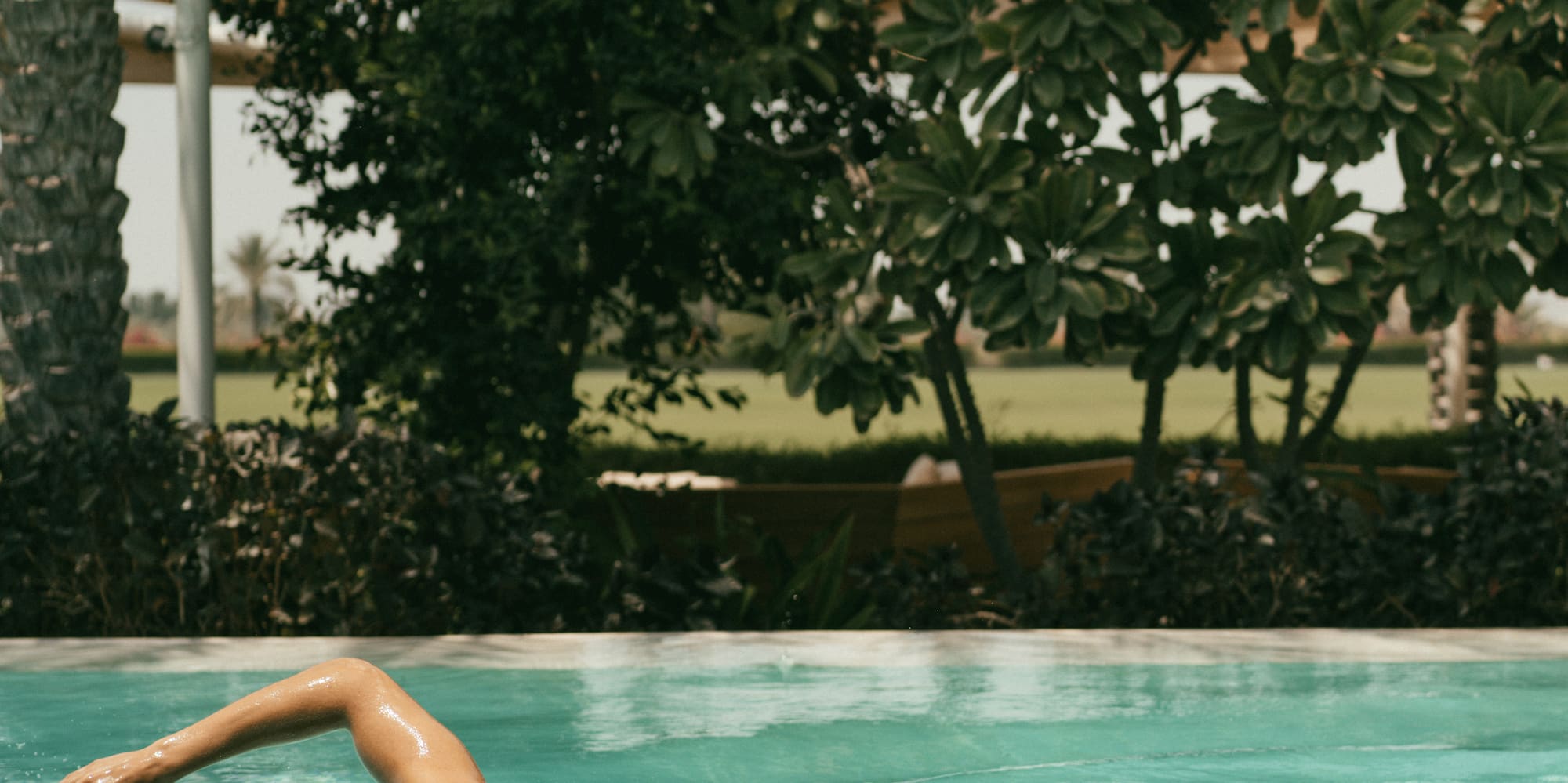 a man swimming in a pool