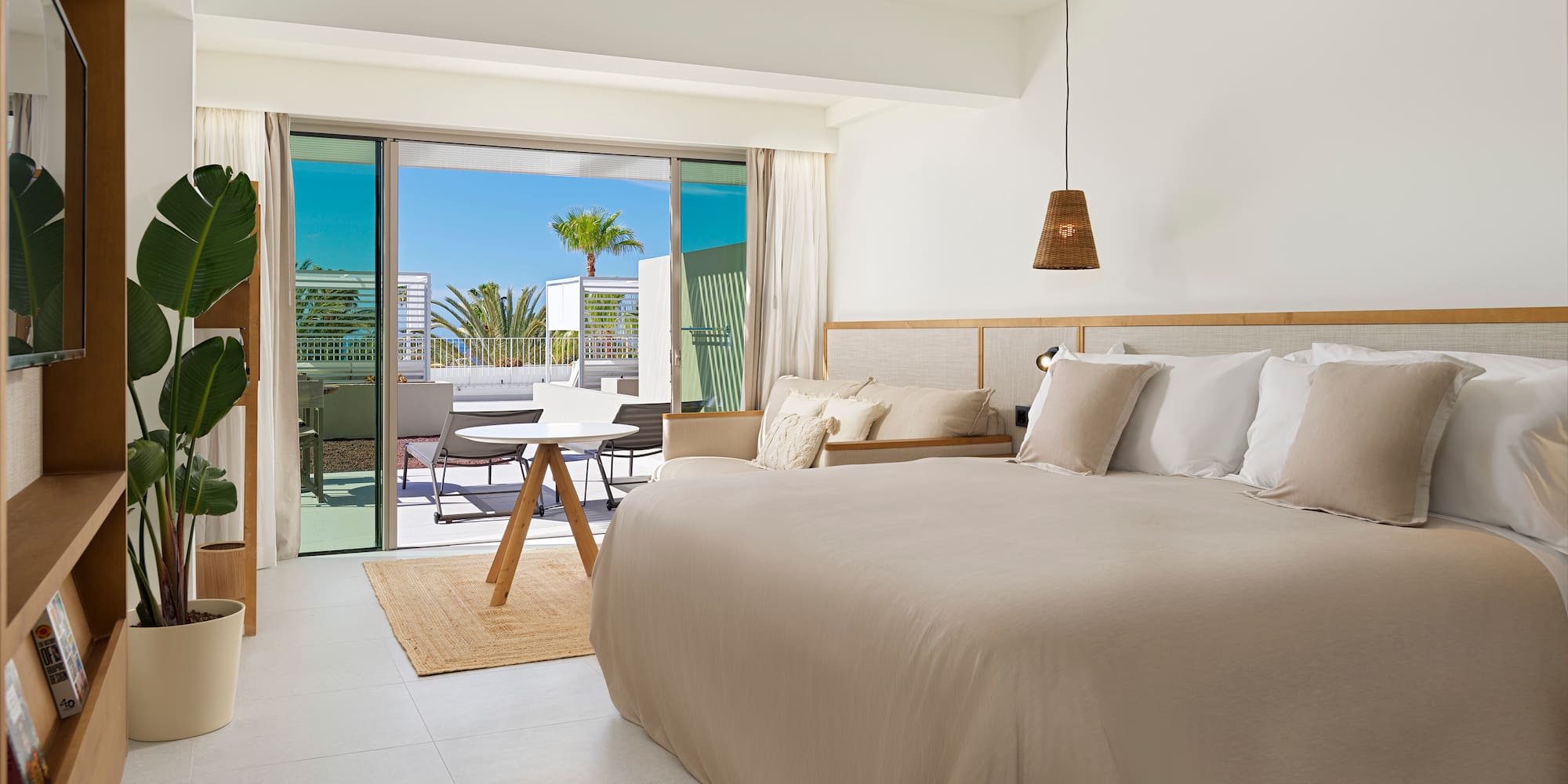 a bedroom with a bed and a ceiling fan