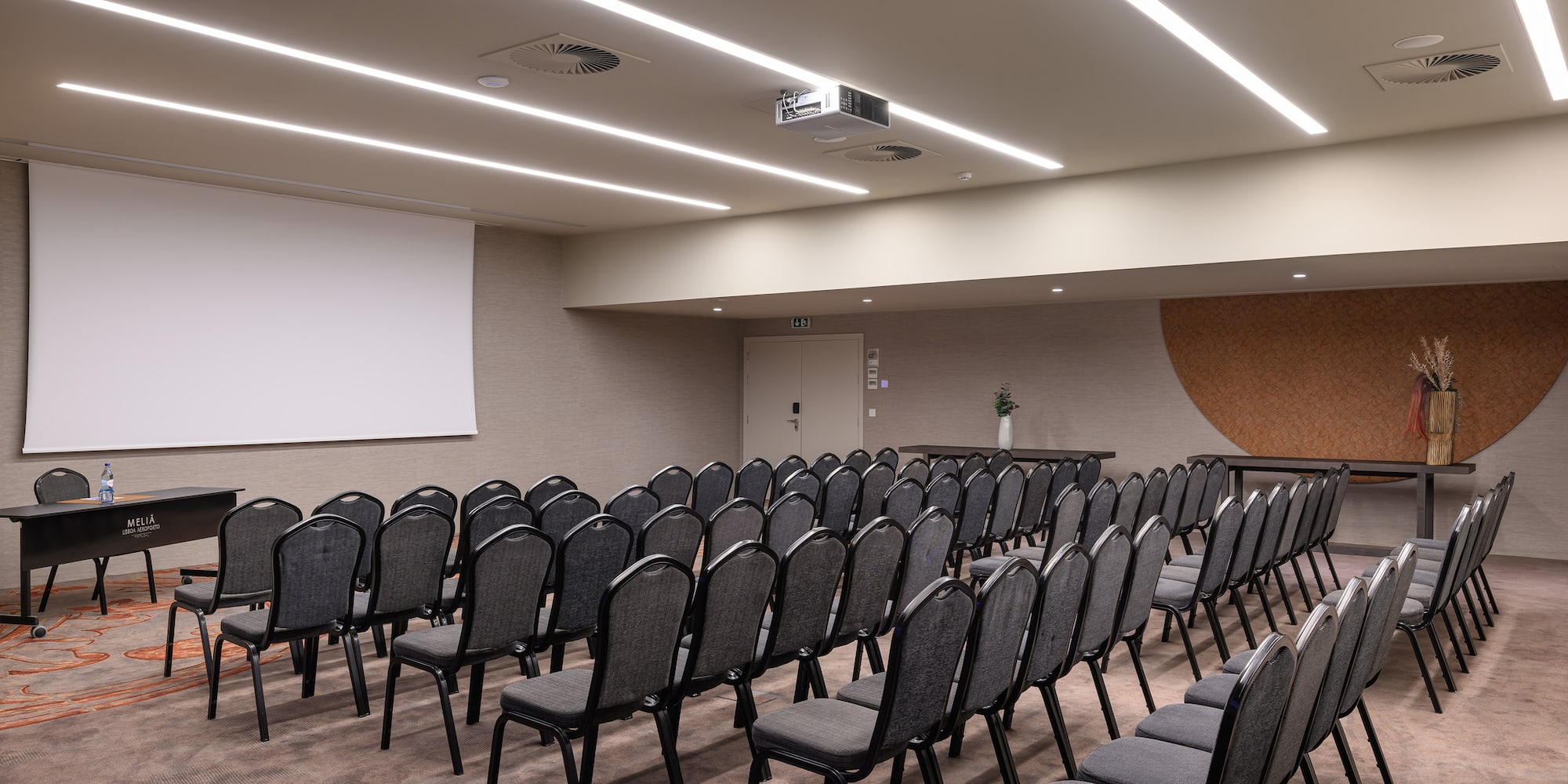 a room with rows of chairs