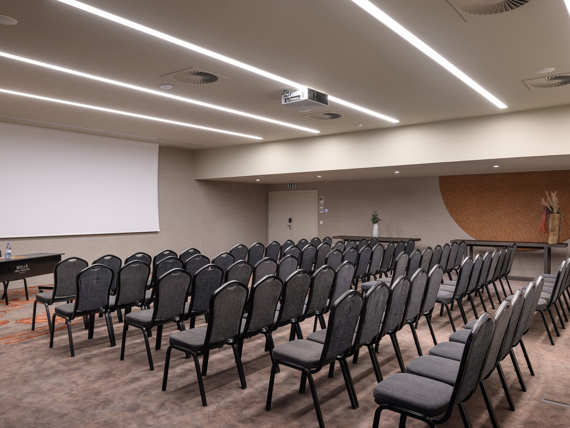 a room with rows of chairs