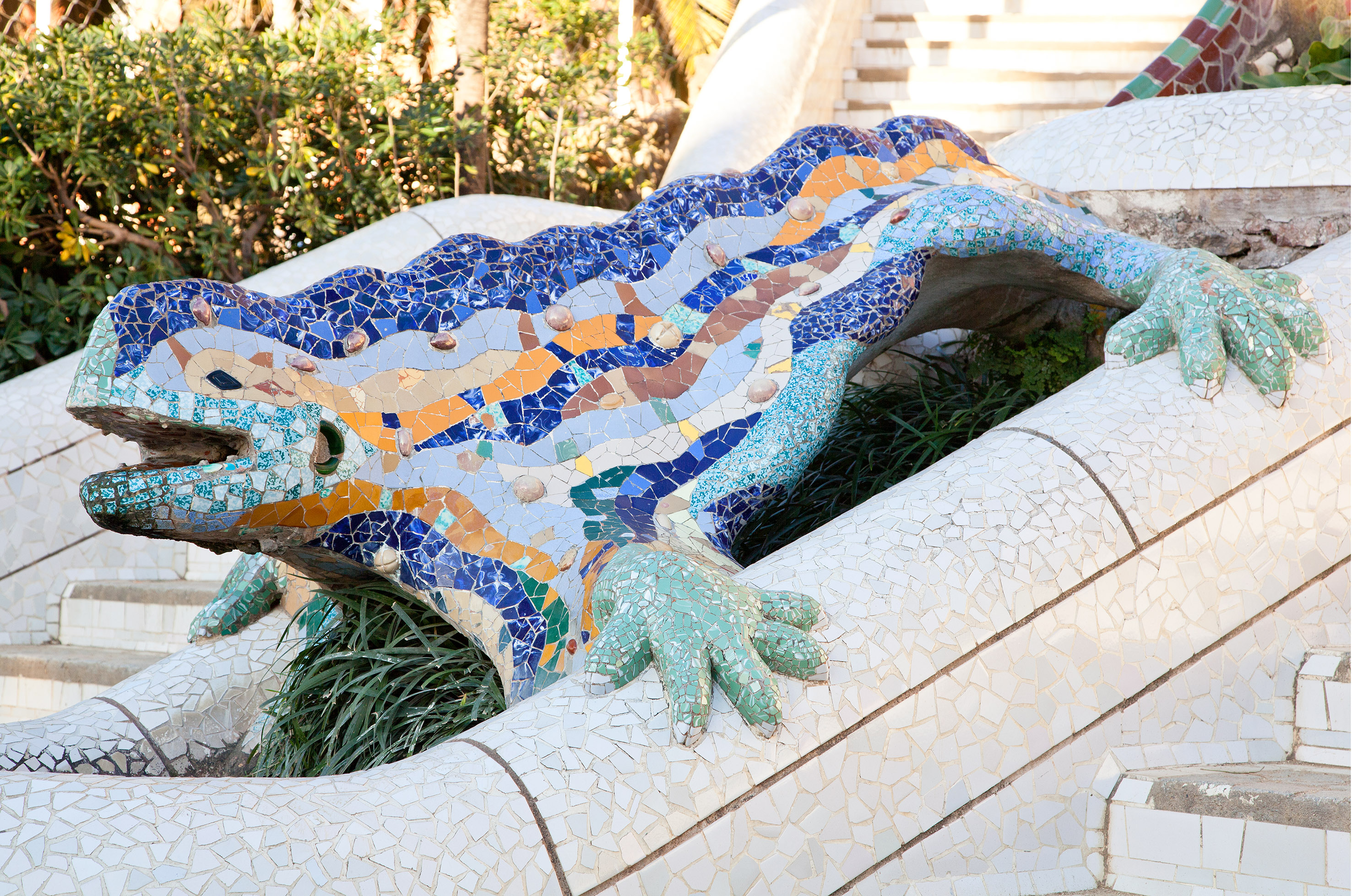 a mosaic lizard on a wall