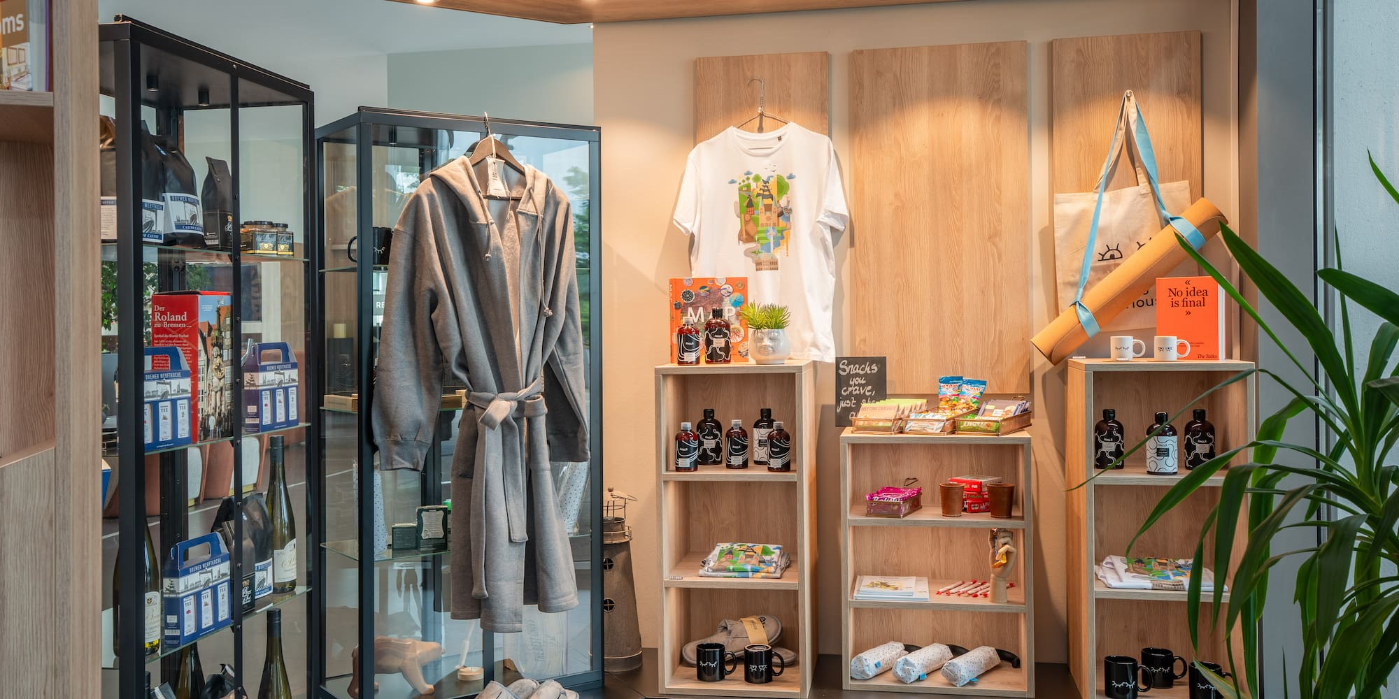 a room with shelves and shelves with a robe and bottles
