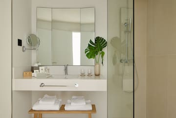 a bathroom with a mirror and a sink
