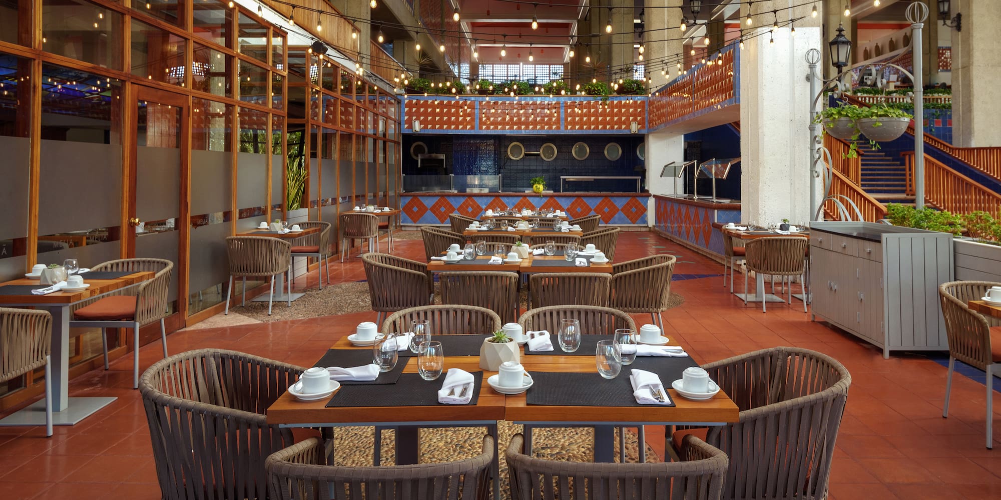 a restaurant with tables and chairs