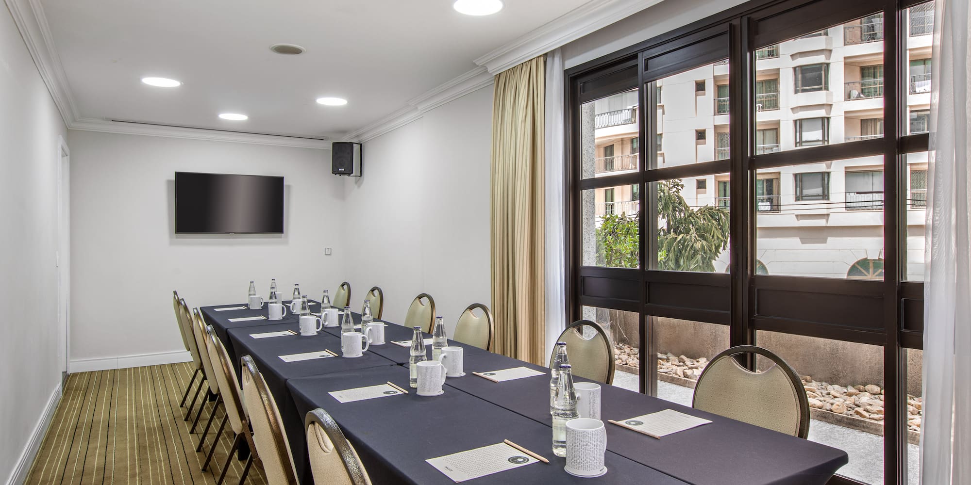 a room with a table and chairs