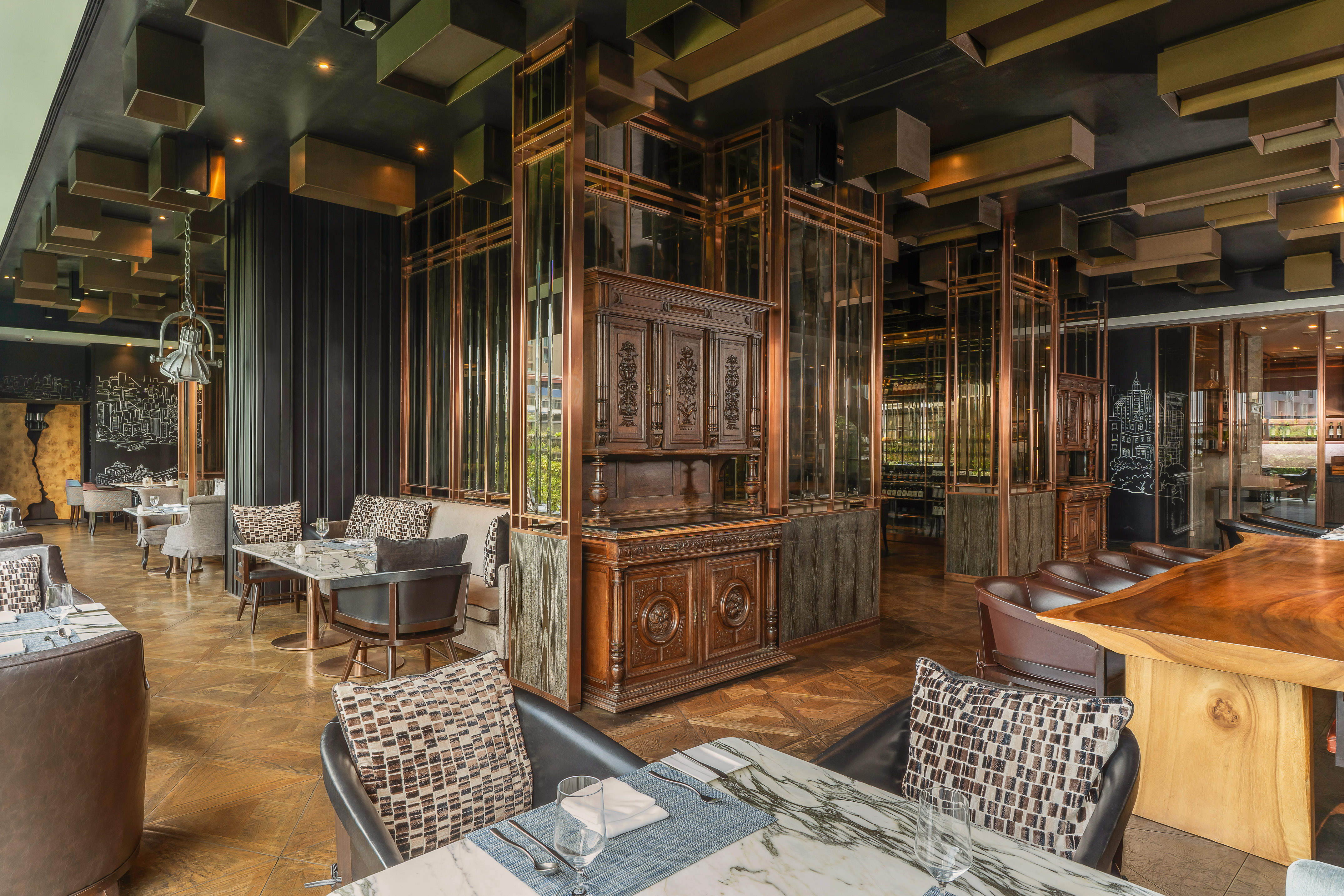 Luxury restaurant interior with marble tables, copper accents, and wooden cabinets. - Scalini, Ιταλική κουζίνα - The Kasem House Bangkok Hotel Affiliated by Meliá, Μπανγκόκ