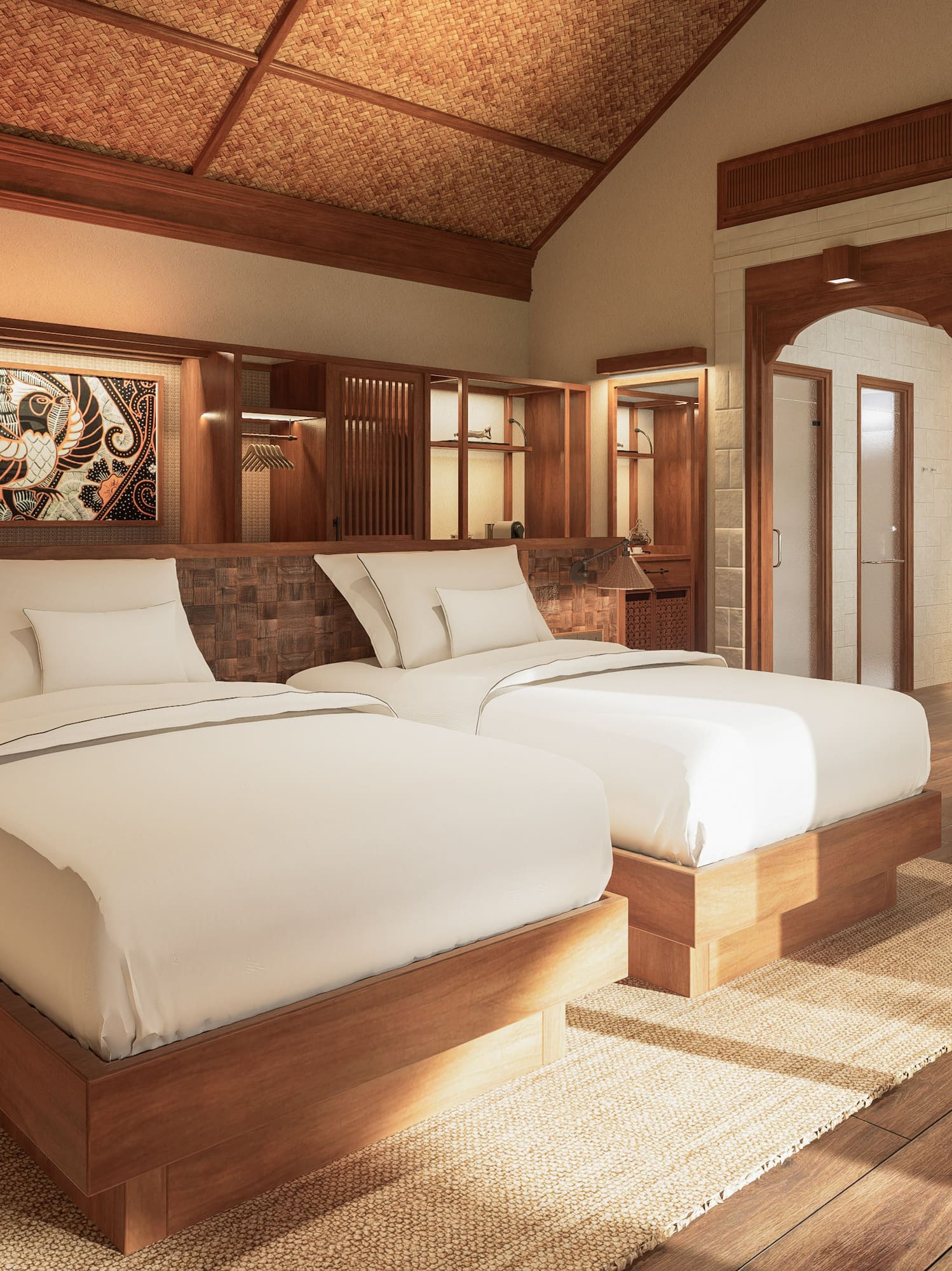 a room with two beds and a chair