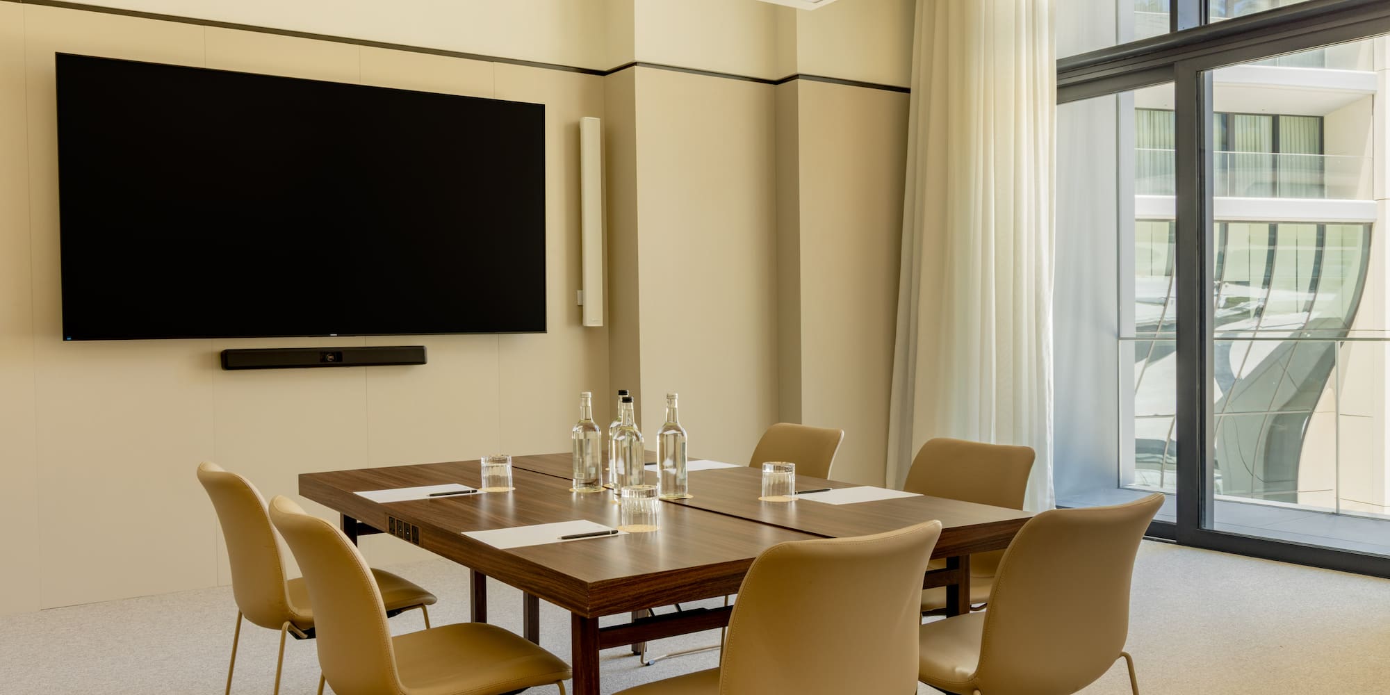 a room with a table and chairs